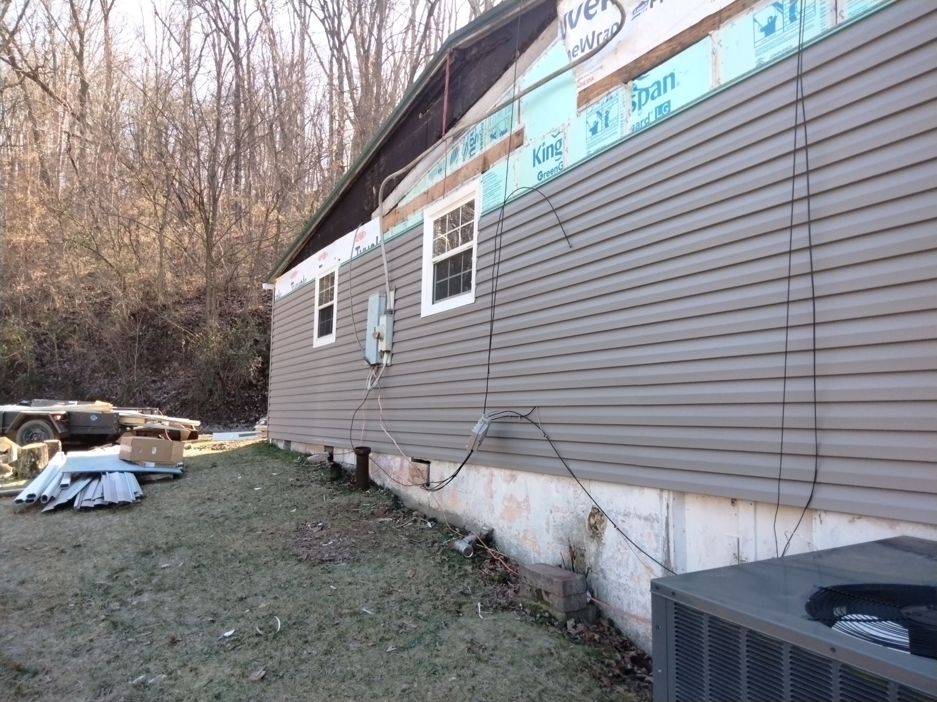 Secure Construction Company Inc. is thrilled to present the dramatic transformation of a residential property, given a new lease on life through our expert renovation work. by Secure Construction Company Inc