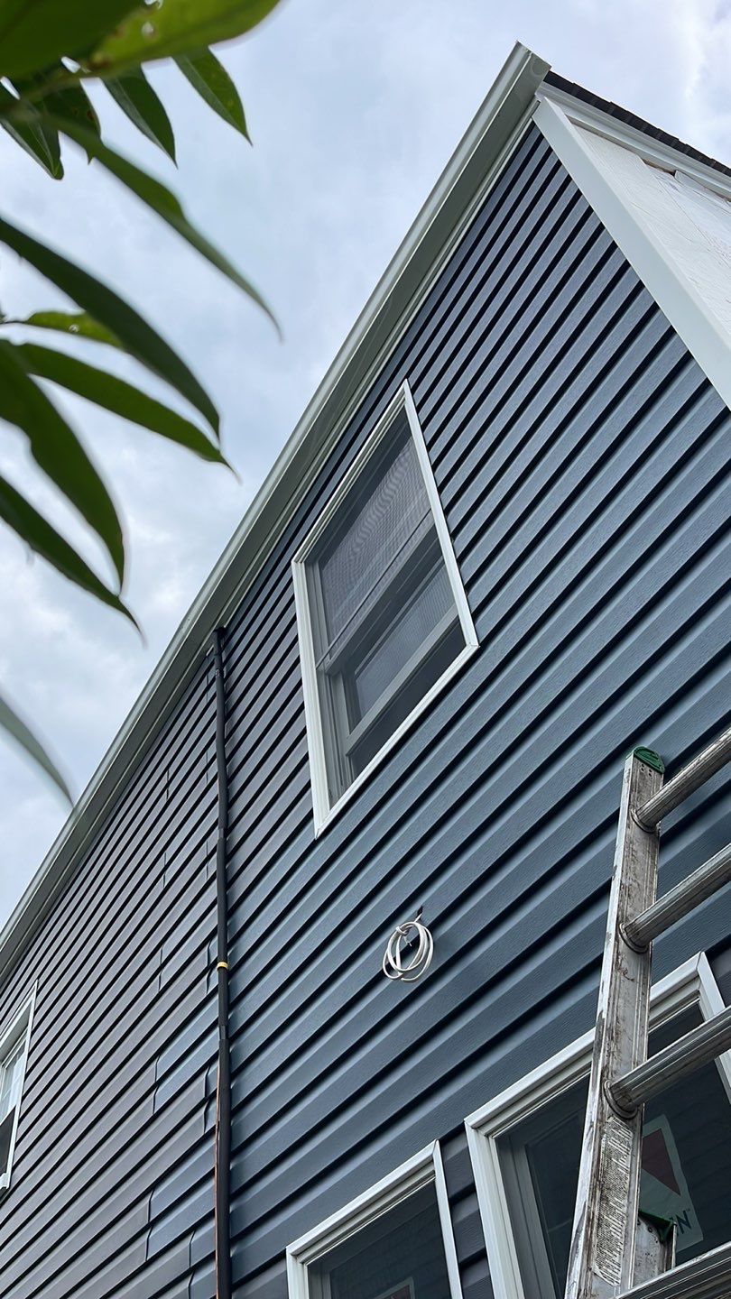 Gutter Installation using 5"white K style seamless gutters and 2x3 white leaders by Above All Gutters 