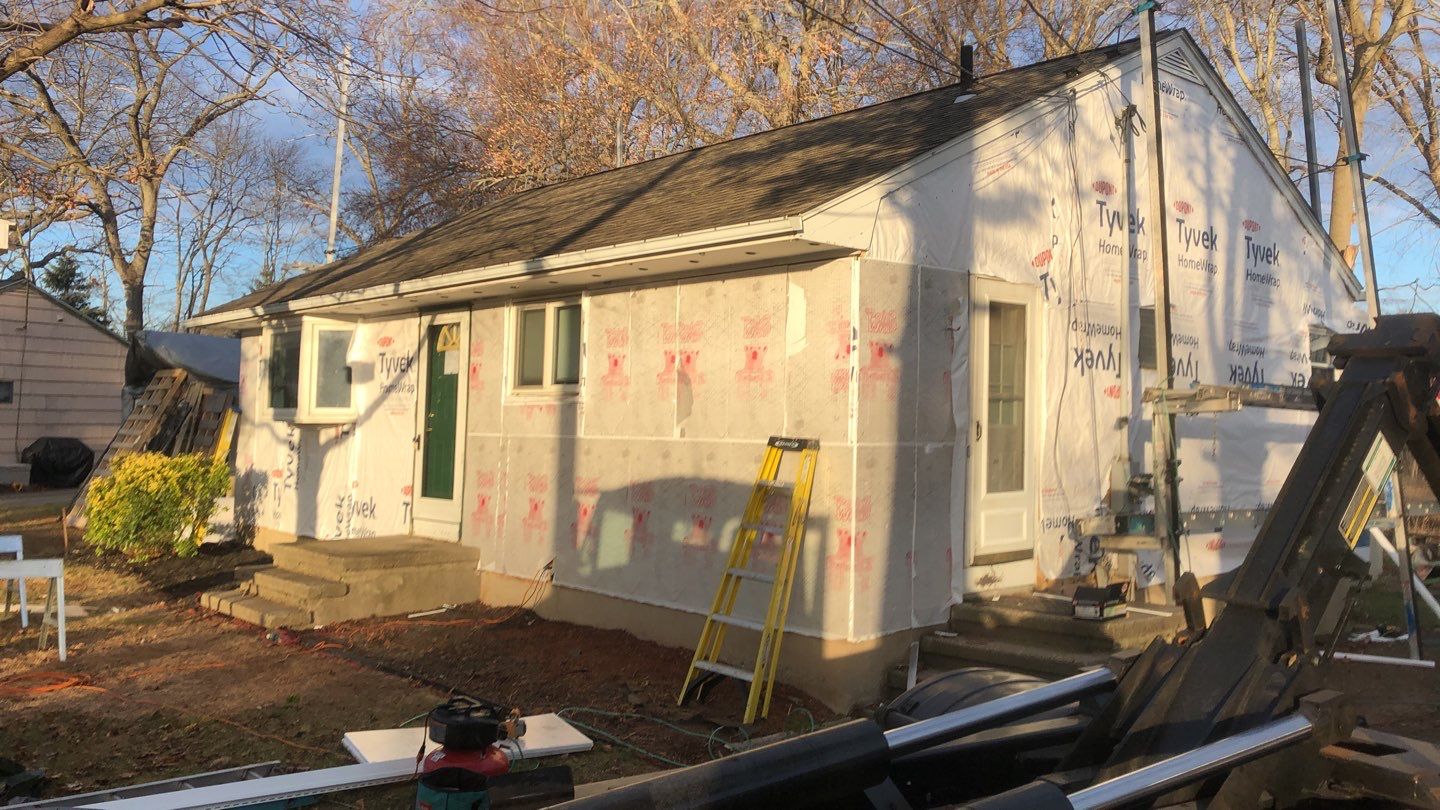 Siding Installation using Certainteed Mainstreet Forest Green by A Plus Exterior