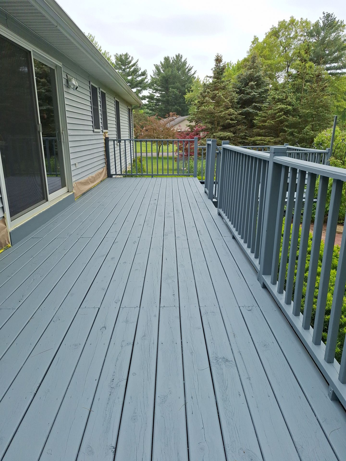 Repaint bedroom furniture, Pergola, and doors. Stain decking by Gordon Painting