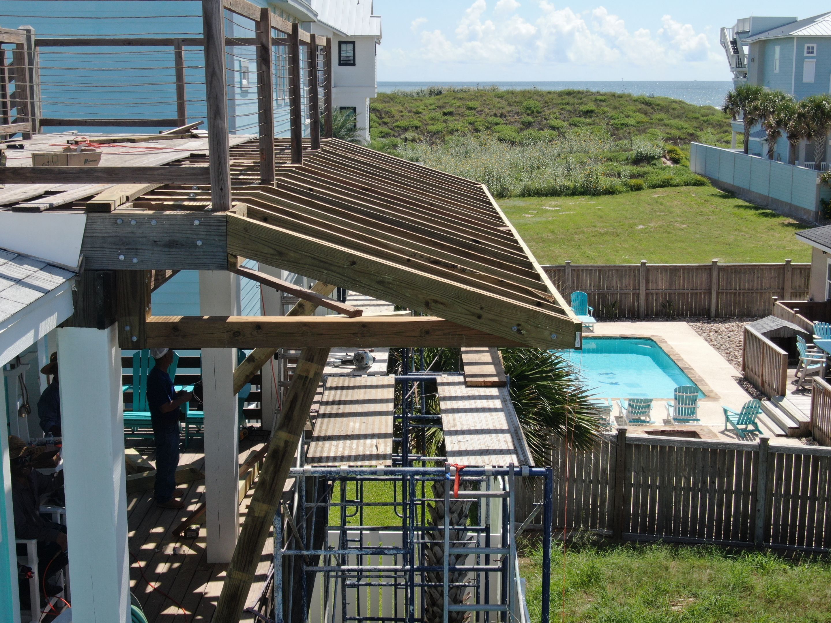 Patio? We got you Covered! by Bayfront Roofing and Construction