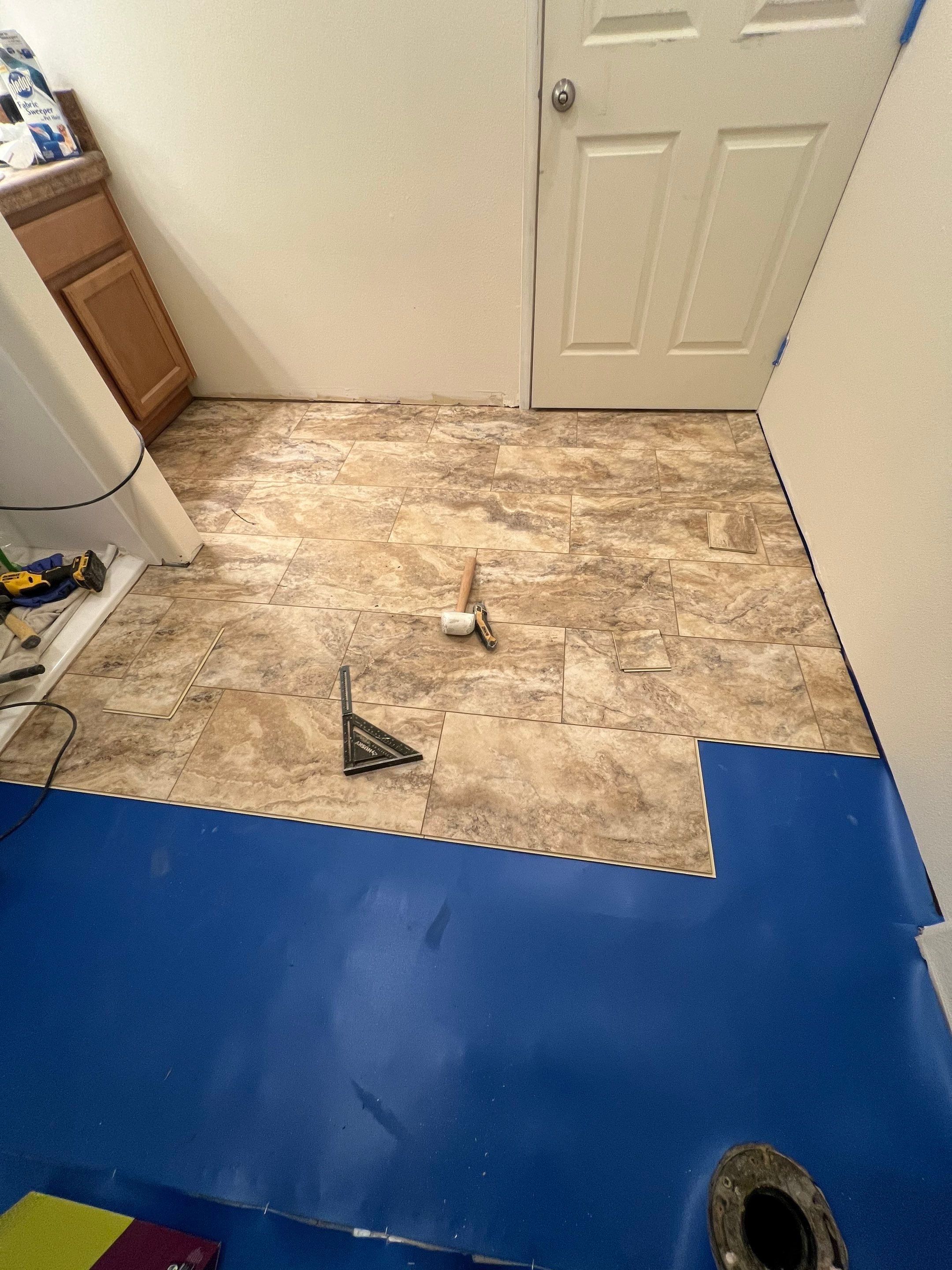 Bathroom flooring upgrade by Handyman State LLC