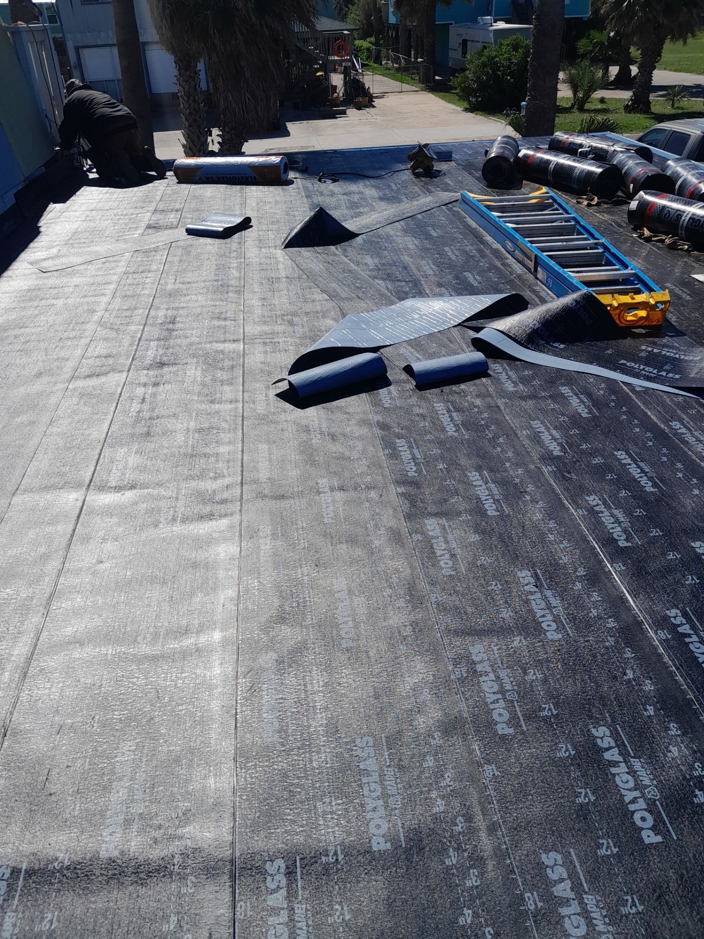 Island Torch Time by Bayfront Roofing and Construction