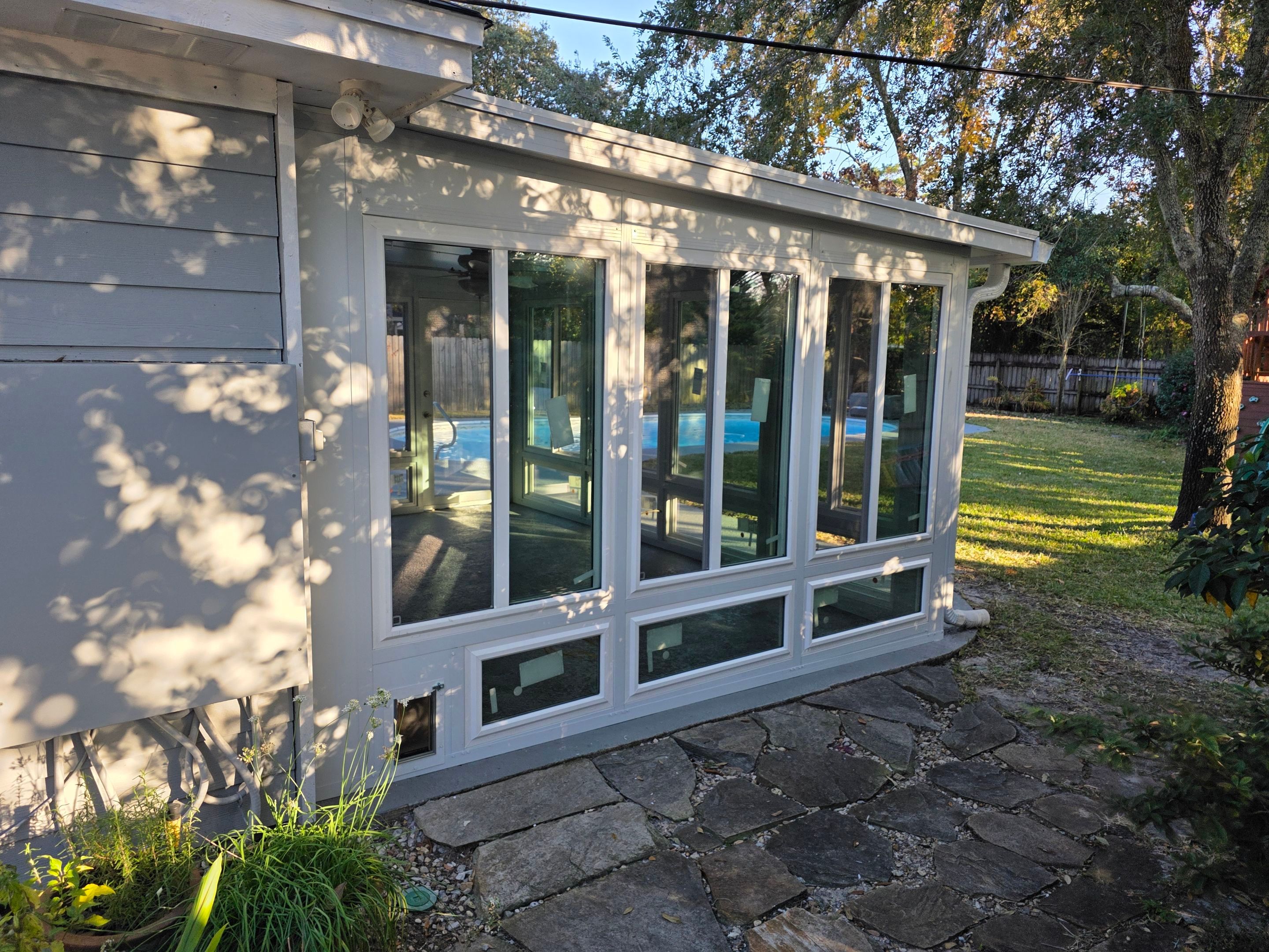 Patio Cover to Glass Room in Mary Esther, FL by Titan Sunrooms