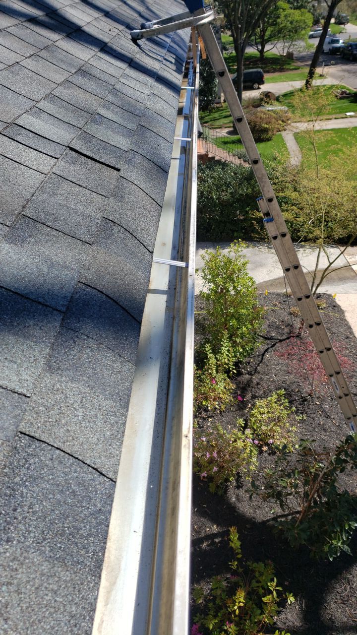 Gutter Cleaning using water by Power Wash Masters LLC