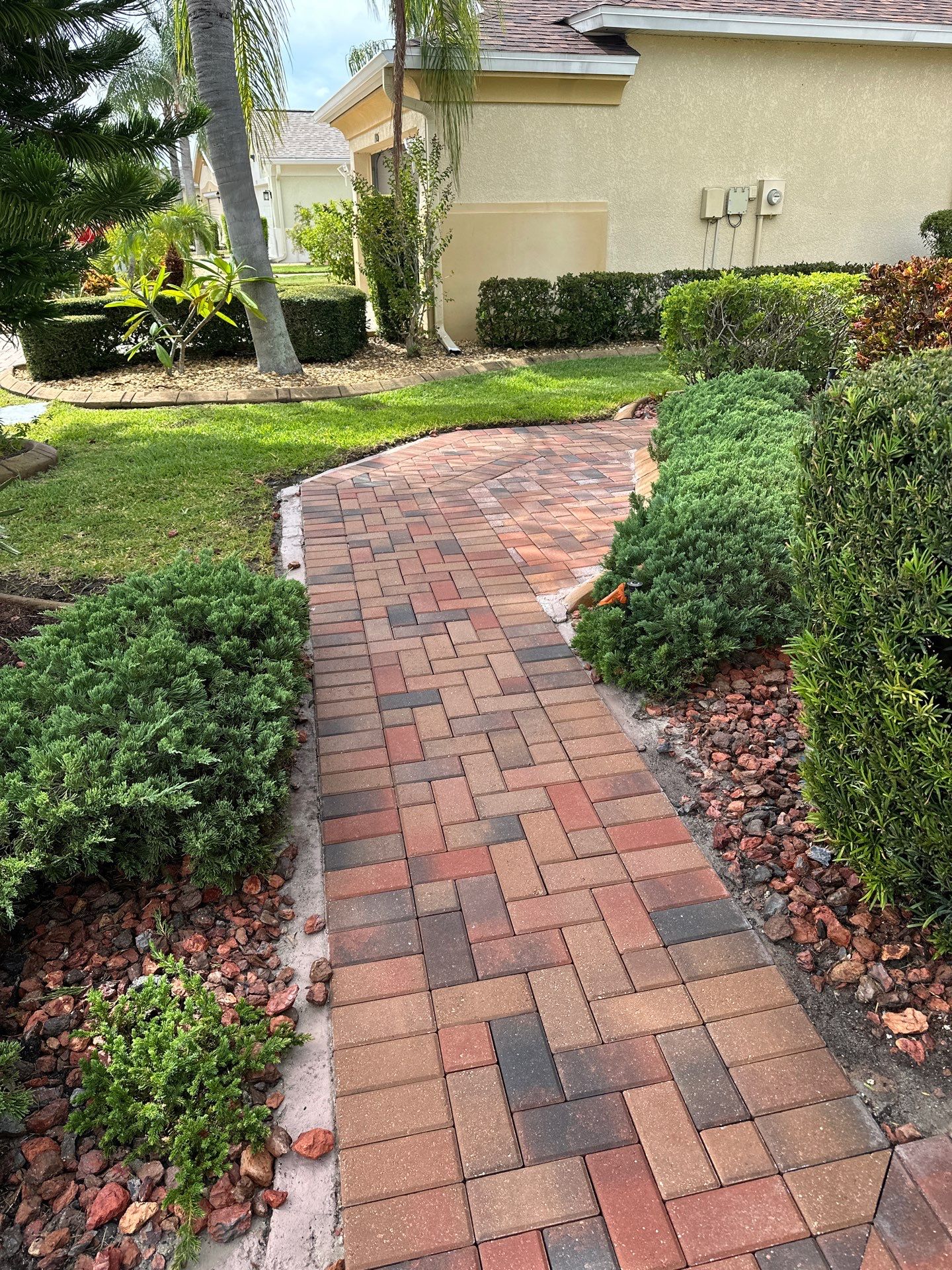 Restoring Multi-Tone Paver Driveway and Walkways in Sun City Center by Supreme Paver Experts