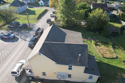 Residential Roofing Installation using GAF Timberline HDZ Weatherer Wood