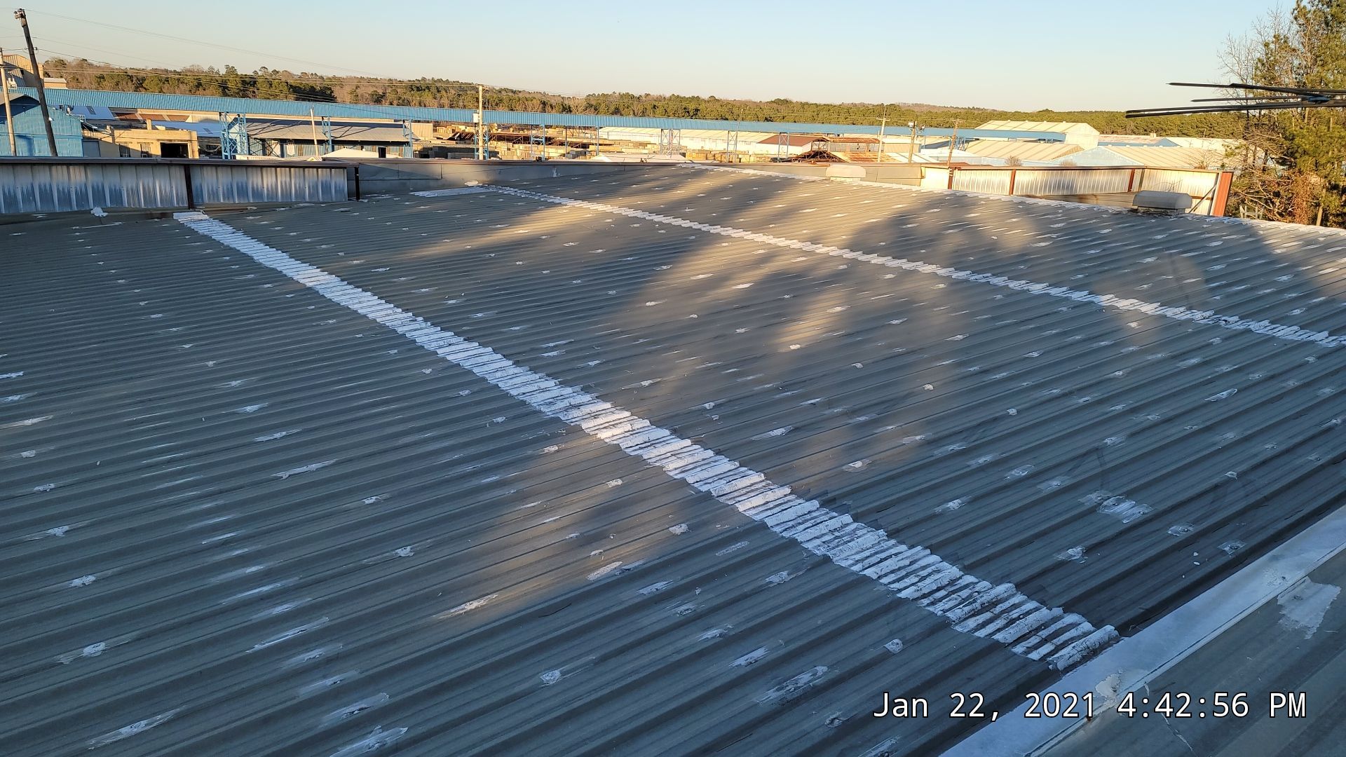 Commercial Roofing Installation using Aldocoat Coatings by Hostetler Roofing