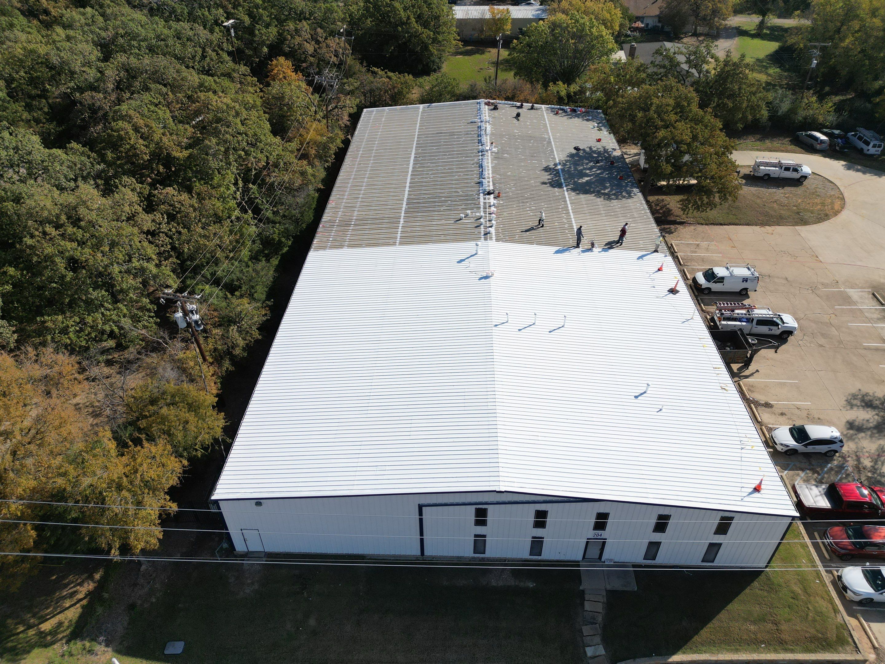 Silicone Coating Metal Rehab by First Out Roofing 