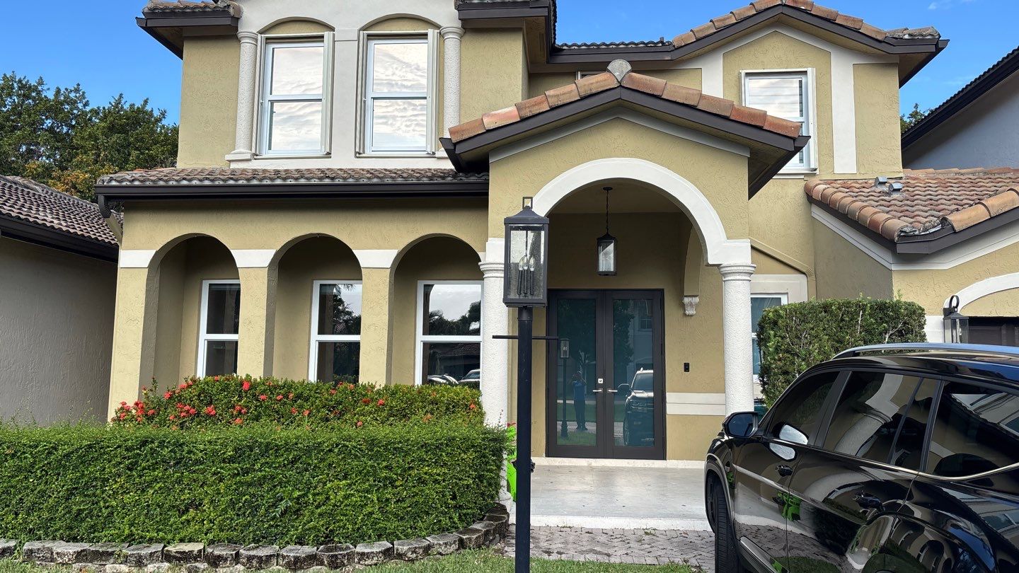 New Windows and Doors with a Striking Front Entry Door by ASP SuperHome