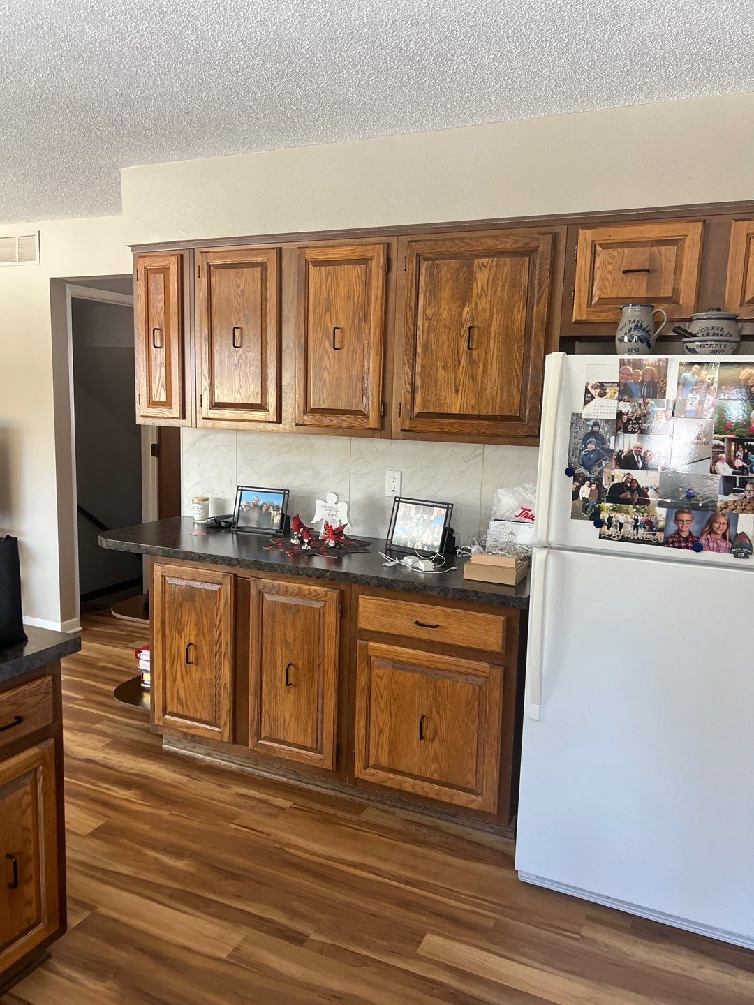 Kitchen Cabinet repaint by Cutting edge painting 
