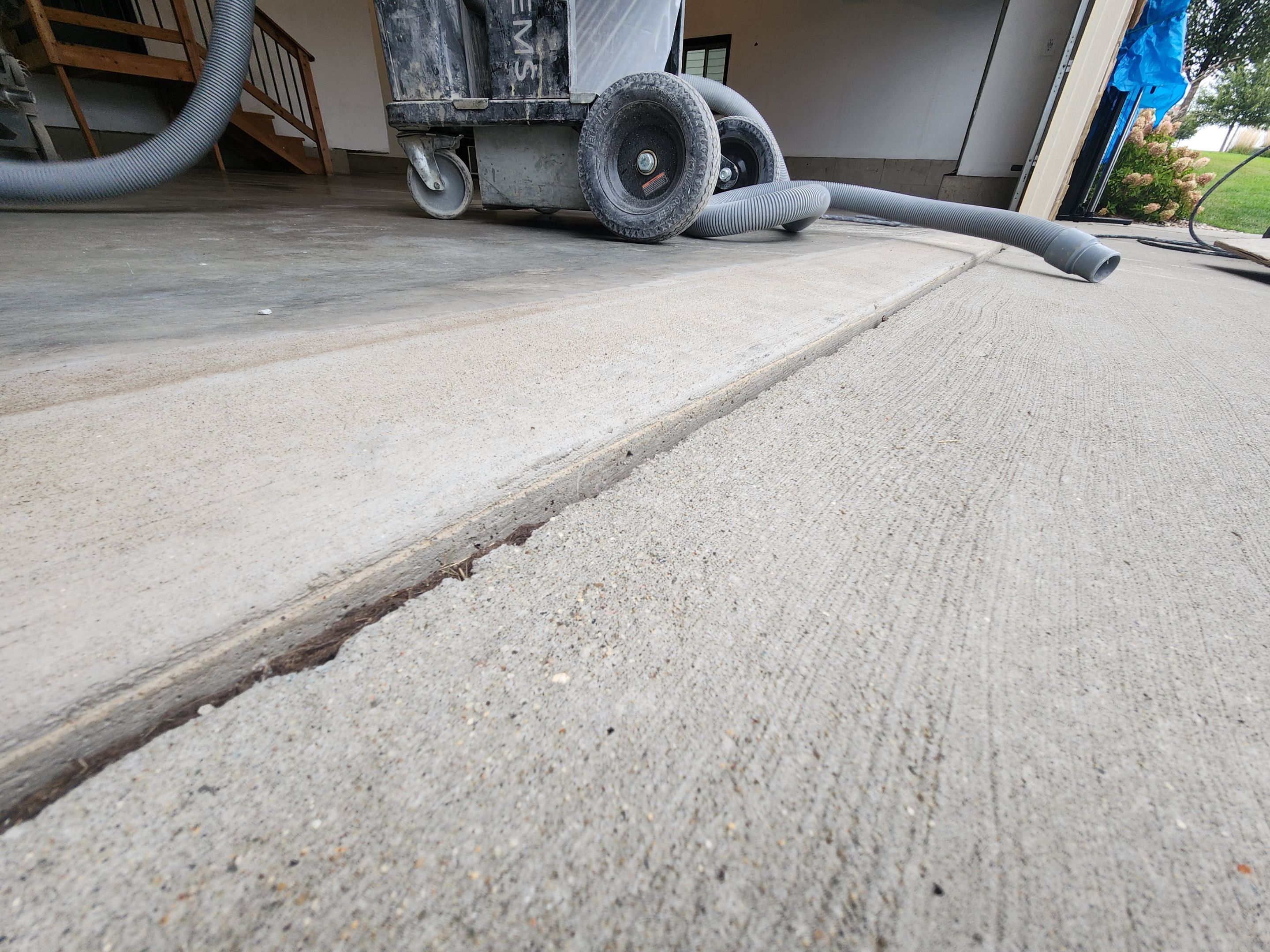 Domino Flake Garage Floor Epoxy Coating in Brandon by Select Painting, Coatings & Garage Cabinets