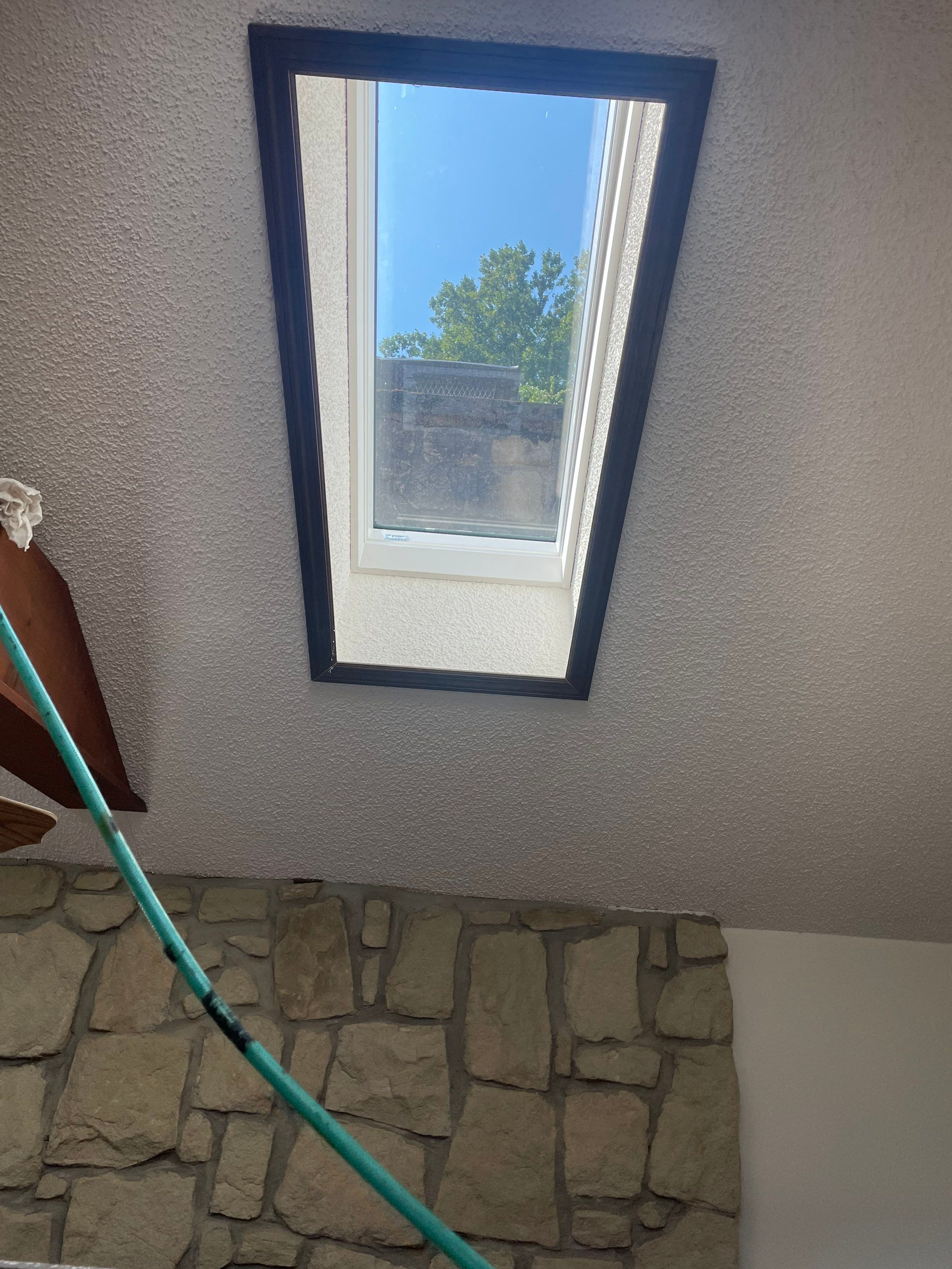 Shingle Roofing with Velux Skylight replacement and stone chimney flashing  by Secure Construction Company Inc