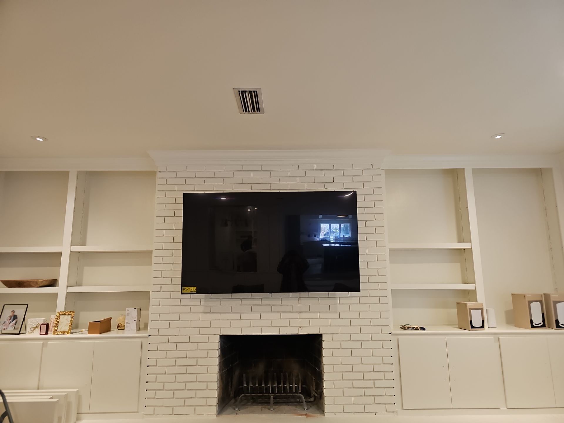Fireplace TV Mounting Projects by Hangman Mounting & Installation 