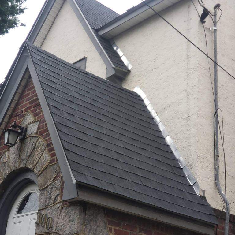 New Roof & Gutters by Island Roofing Inc.