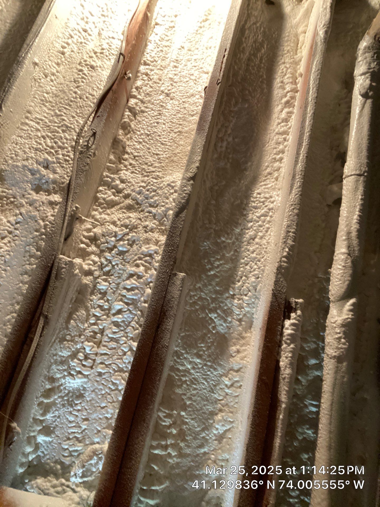 Attic Insulation using open cell spray foam and closed cell rim joist by NYS Foam & Energy