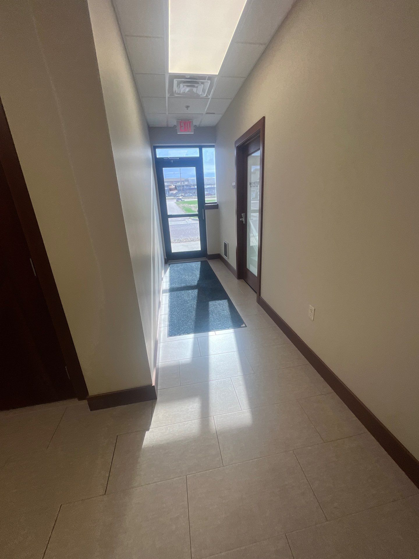 Commercial Office Interior Remodel and Modern Suite Refresh in Sioux Falls by Select Painting, Coatings & Garage Cabinets