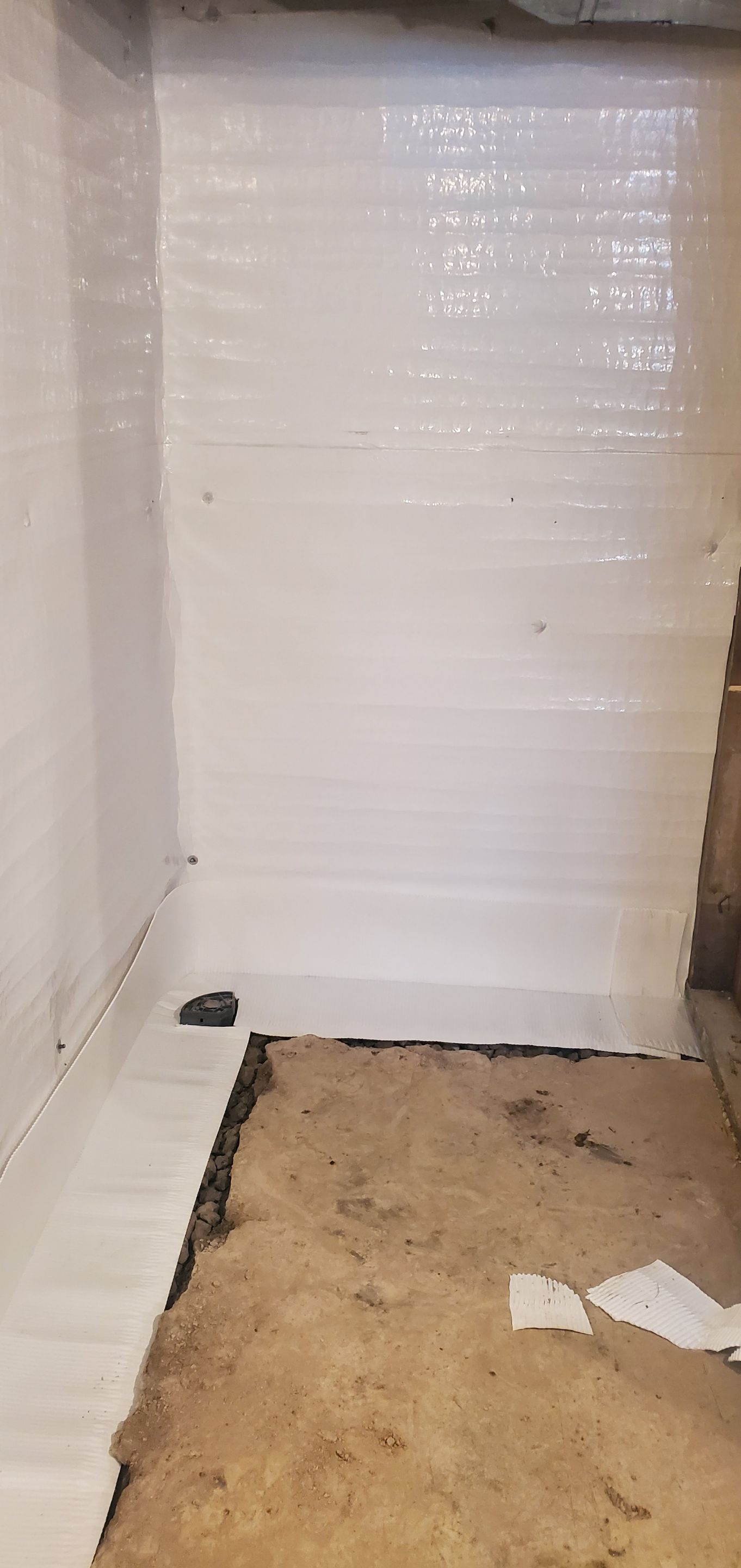 Interior Basement Waterproofing System using GrateDrain Waterproofing System by Toledo Basement Repair 
