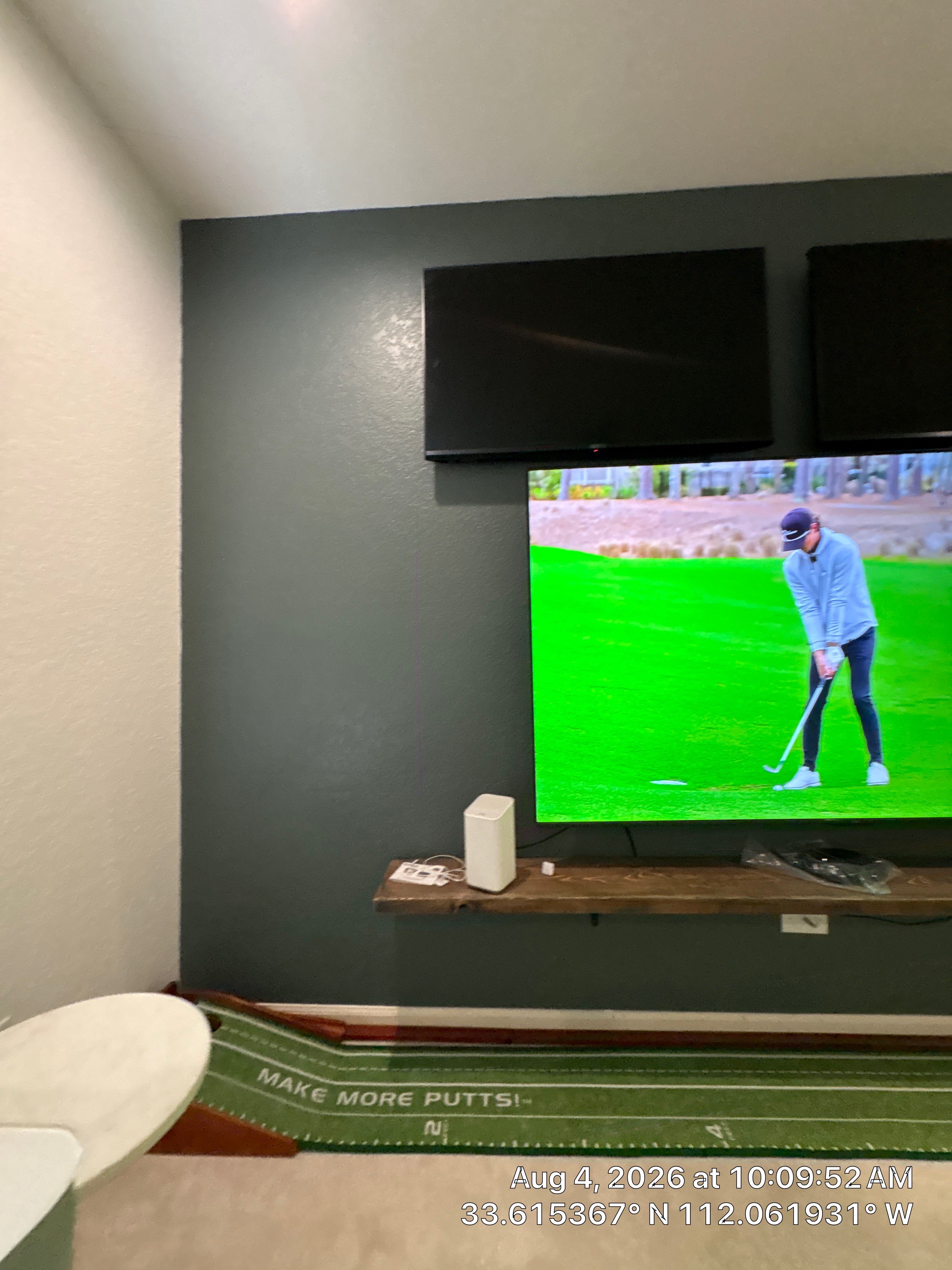 Custom Home Office Setup Featuring Arched Plantation Shutters and Accent Wall by CompanyCam Sales Demo