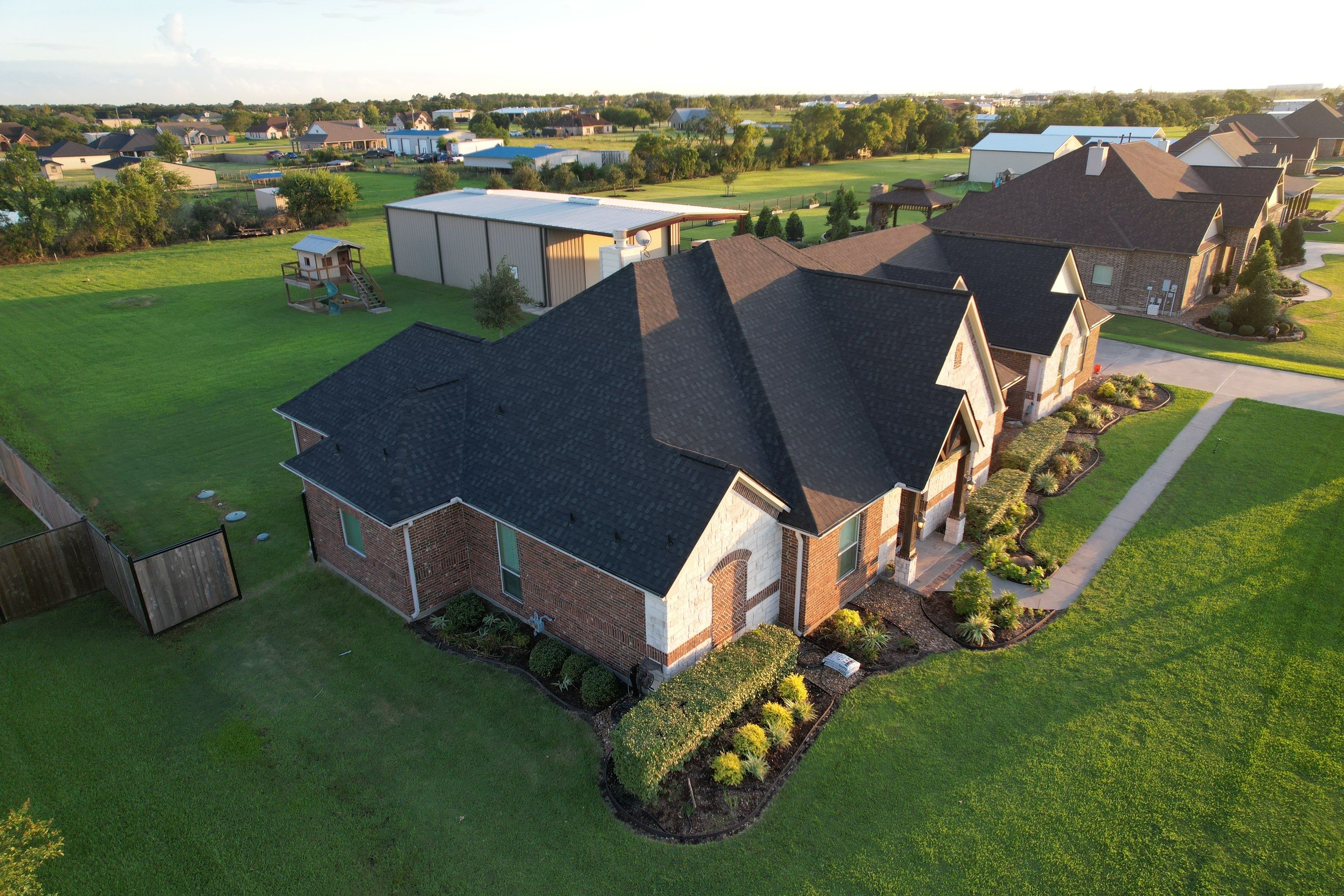 TAMKO Titan XT Rustic Black by STX Roofing