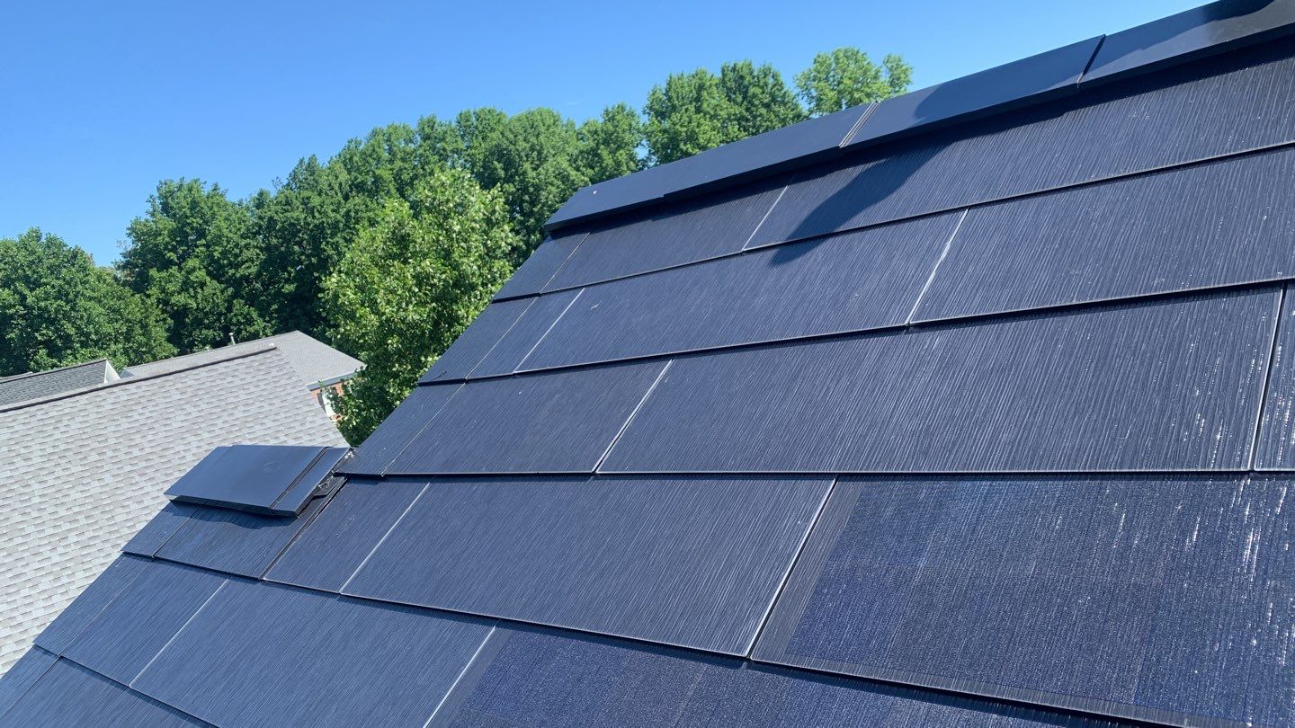 Tesla Solar Roof Replacement using Tesla Solar Roof V3 tiles by American Home Contractors