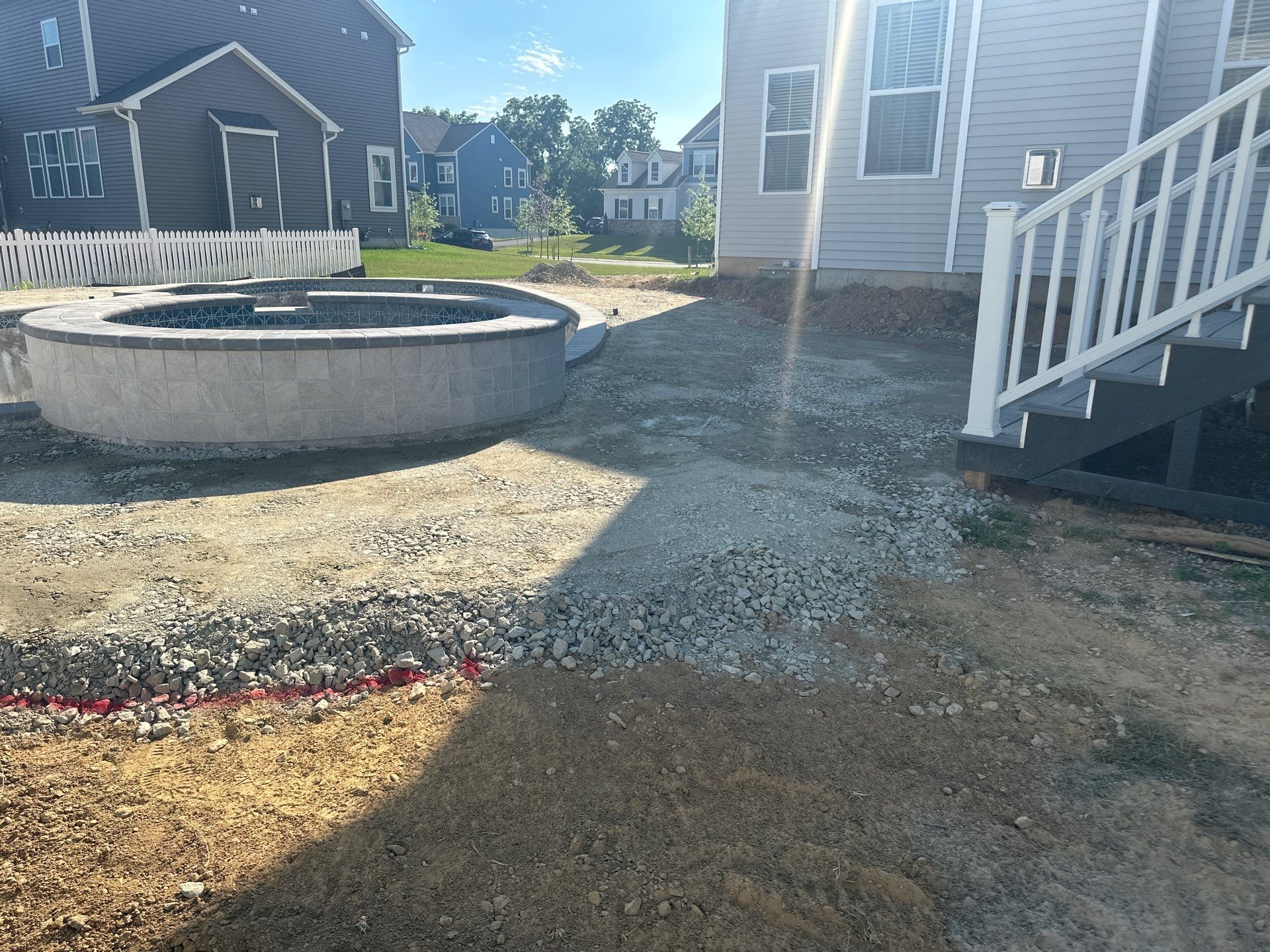 Pool and Hardscape Design in Delaware | Belgard Paver Patio & Outdoor Living Space by Studio G Indoor Spaces & Outdoor Living