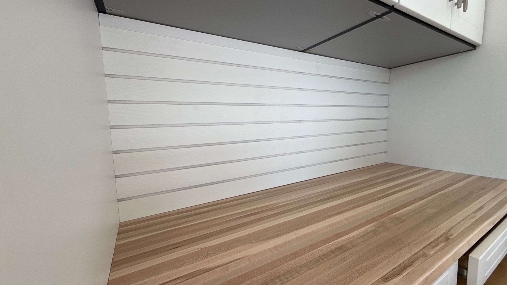 Garage Remodel with Custom Cabinets and Epoxy Floors in Overland Park by Banner Garage