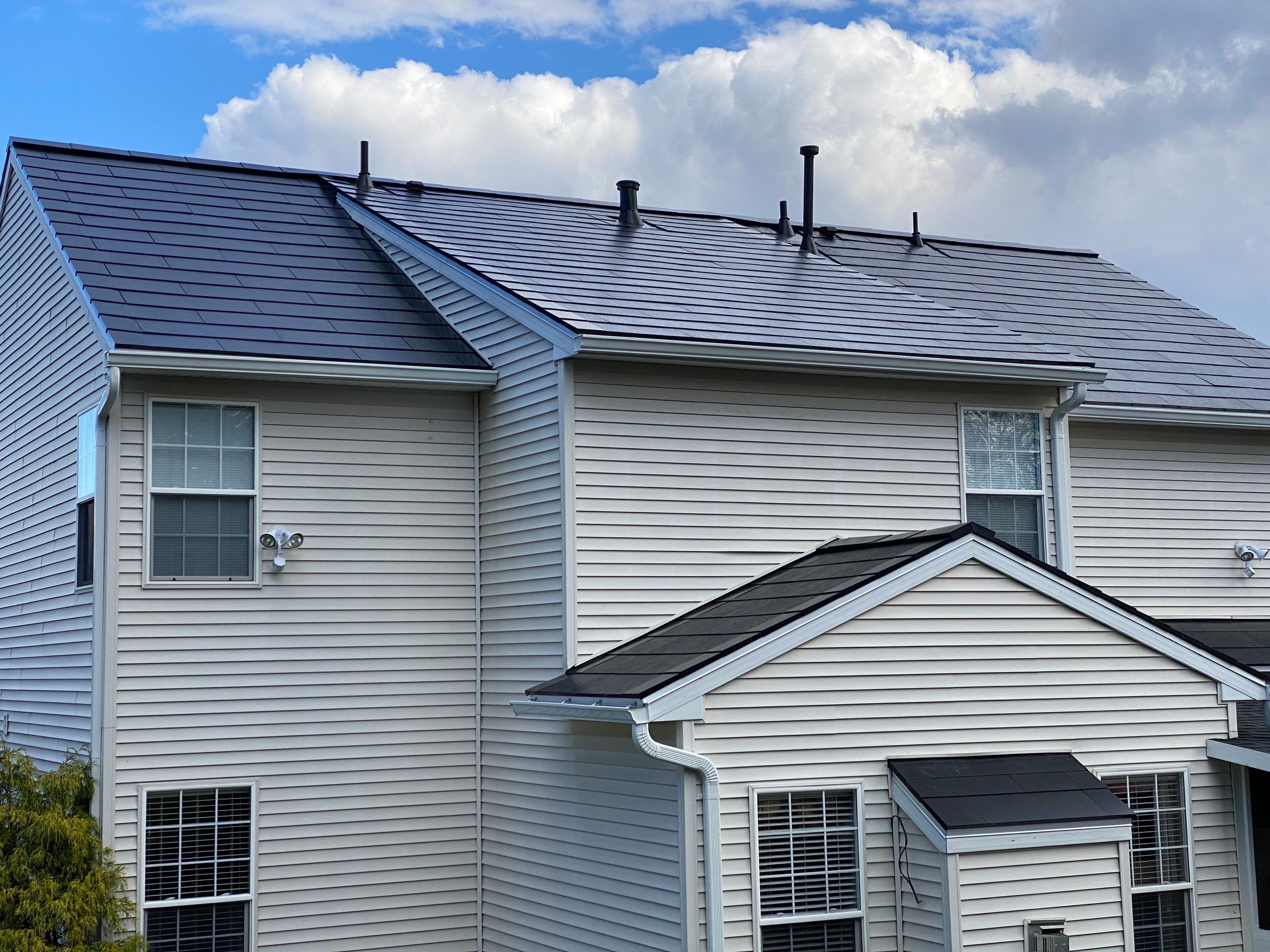 Tesla Solar Roof Installation by American Home Contractors