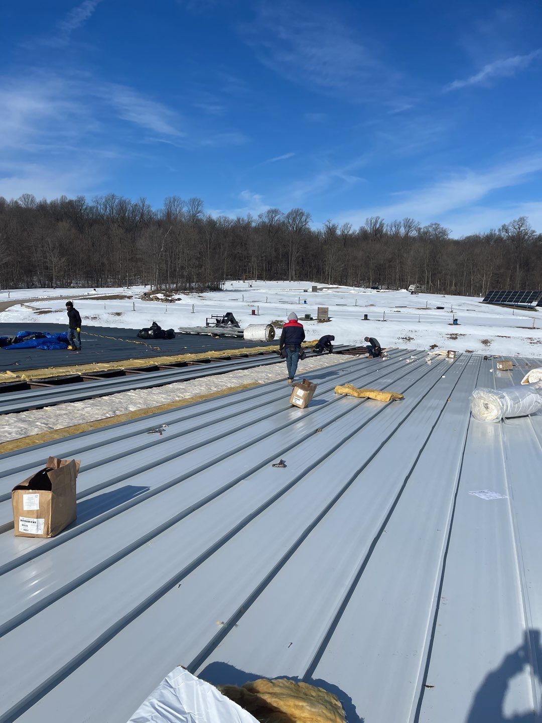 Commercial Roofing Installation using 24 Guage Double Lock Standing Seam by Legacy Roofing & Solar