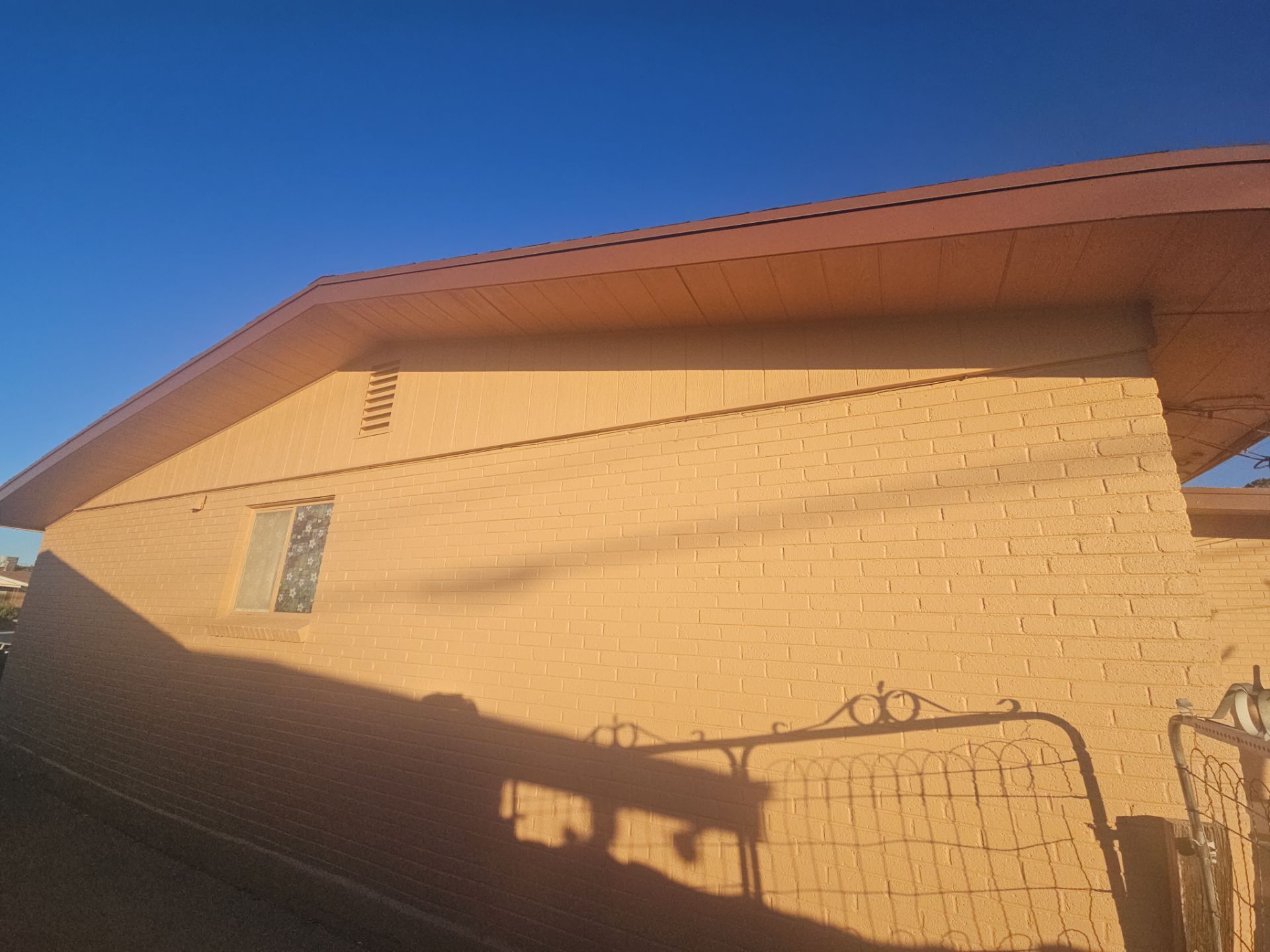 Exterior Painting with Gable Replacement by Regal Renovate