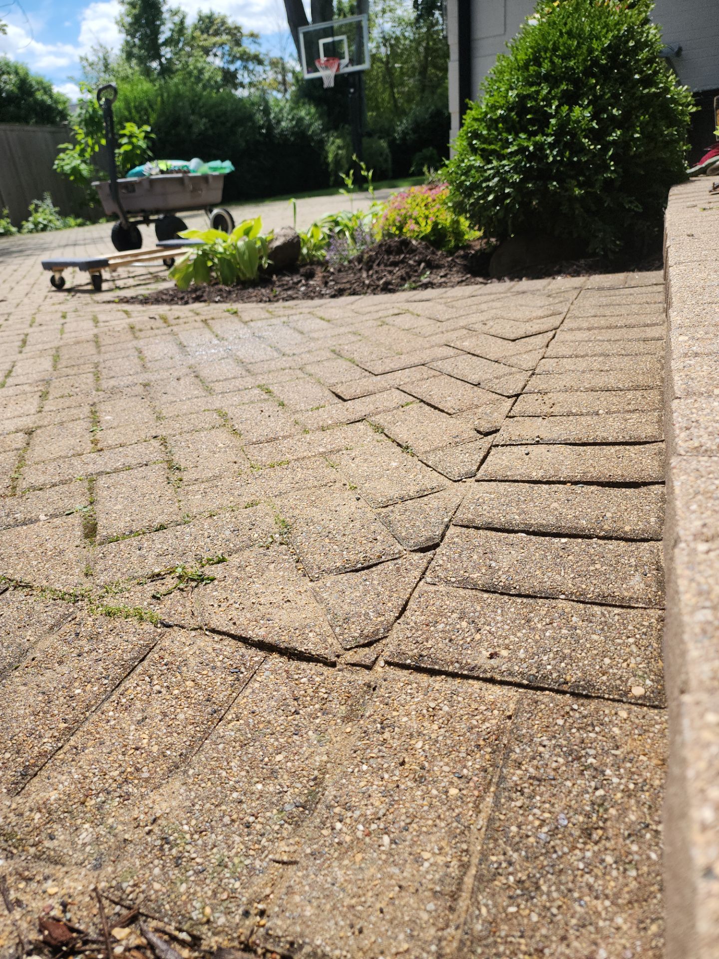 Brick paver repair, cleaning and sealing by Northern Power Washing LLC.