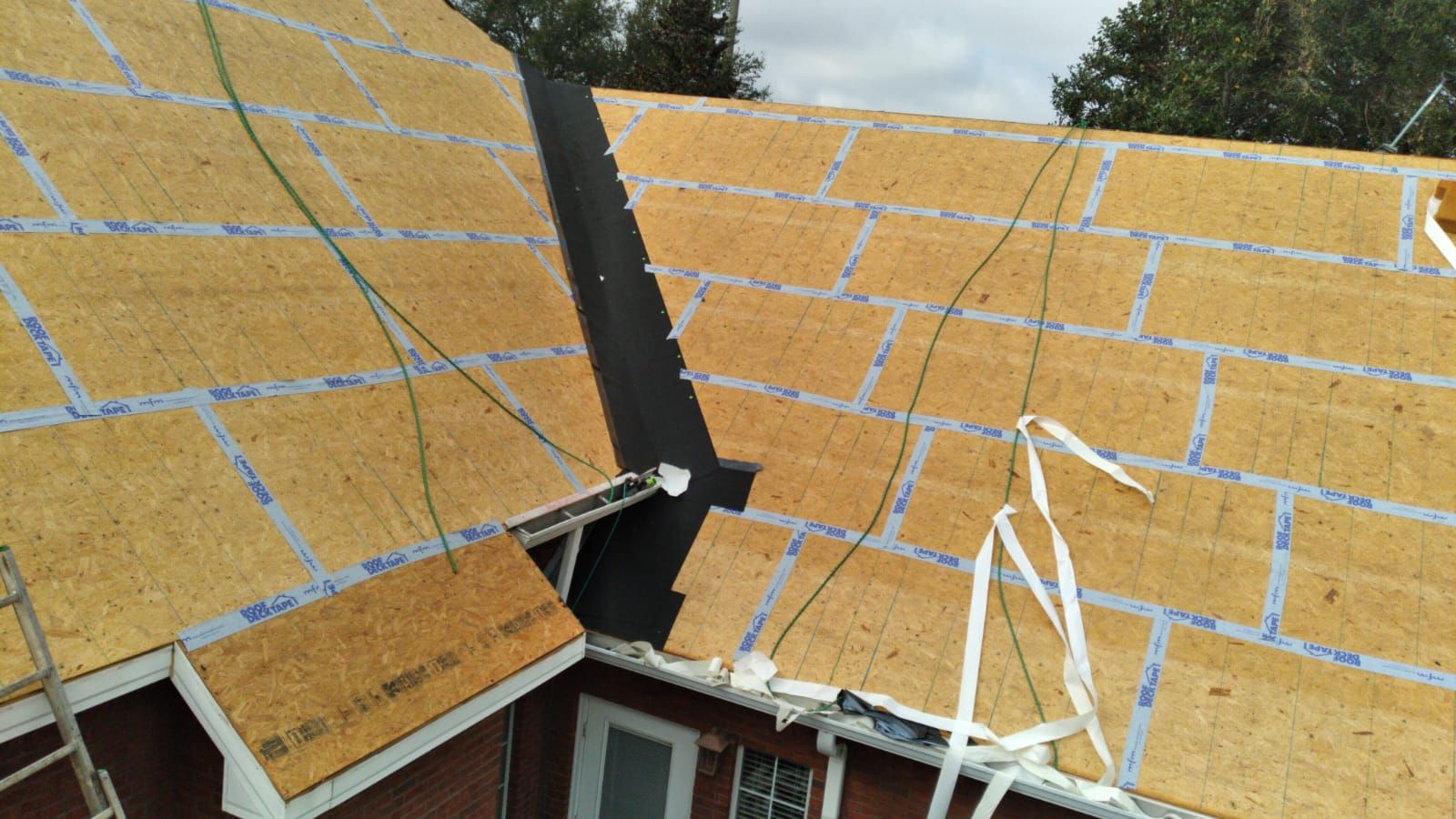 Residential Roofing Installation using Roof Replacement by American Roofing & Construction LLC