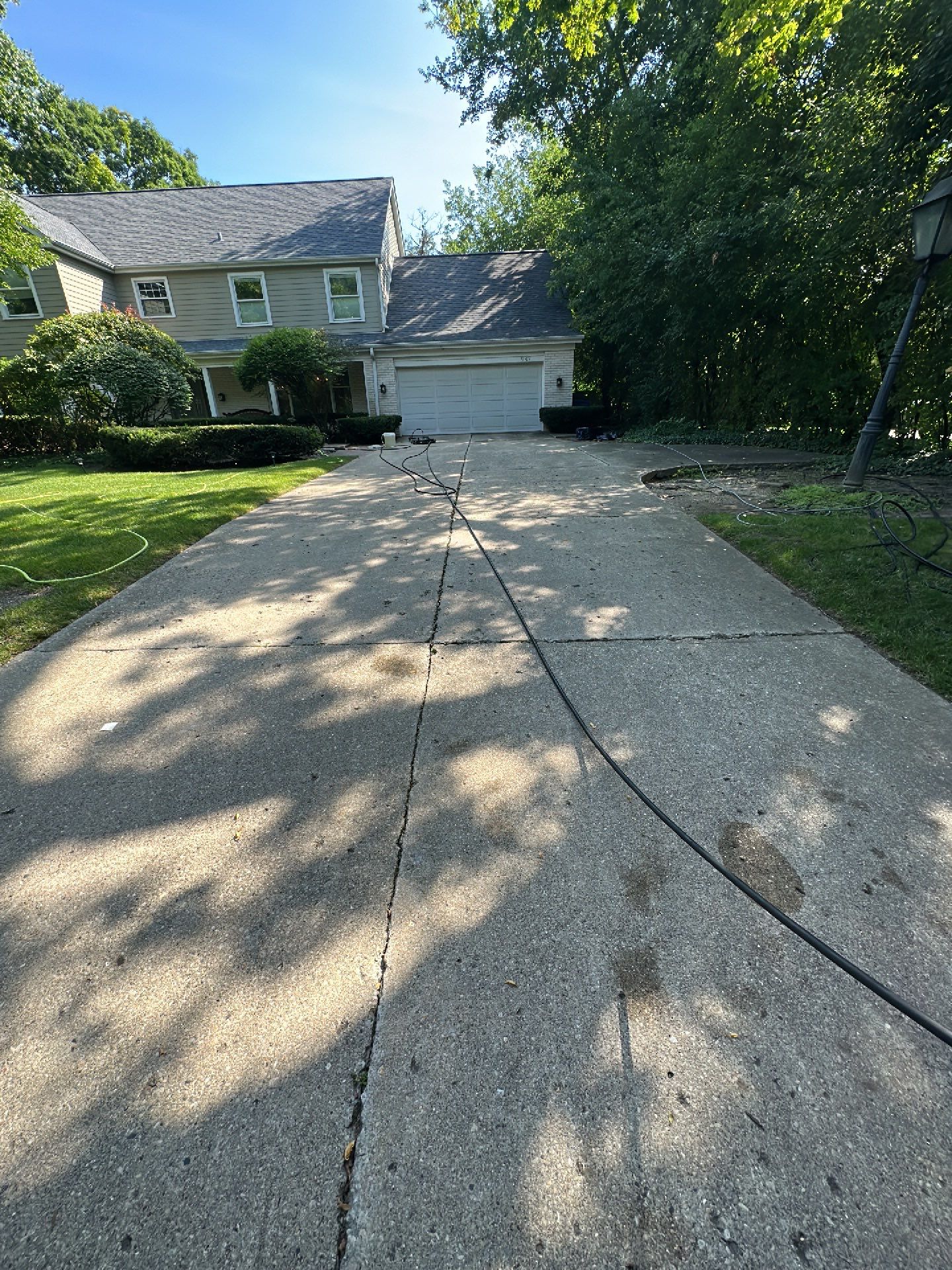 Aggregate concrete cleaning and sealing using Surebond SB-9000 by Northern Power Washing LLC.