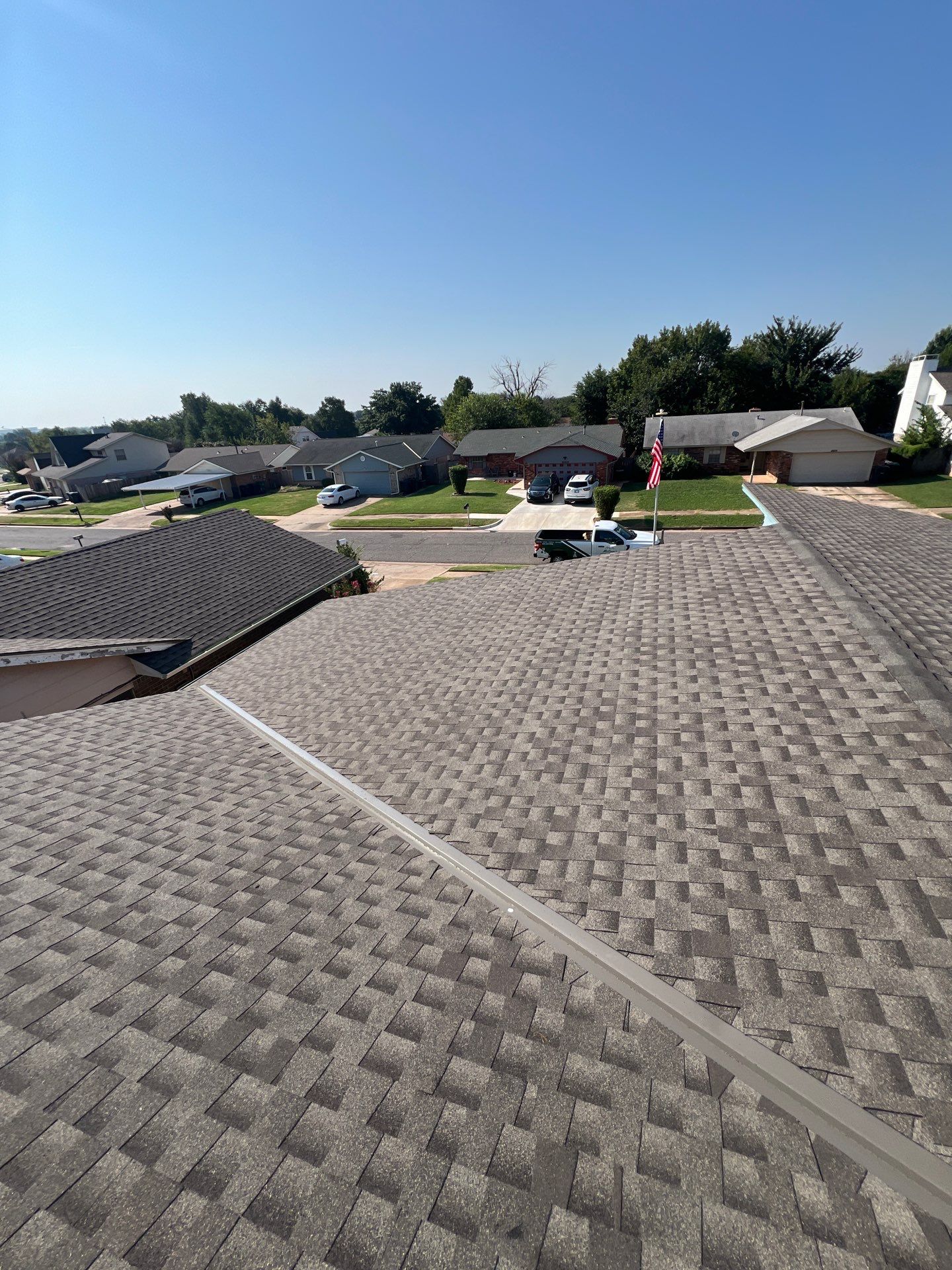 Roof Replacement and Gutter Installation in Oklahoma City, OK by McCann's Roofing and Construction