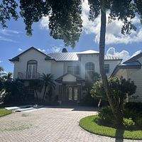 .032 Aluminum 1.5" Mechanical Seam Dark Bronze  by Total Roofing System The Metal Roof Experts