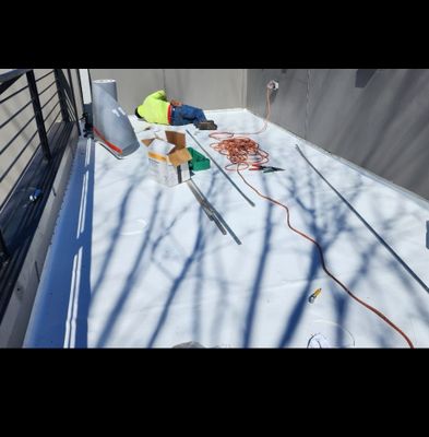 Commercial Roofing Installation using firestone TPO