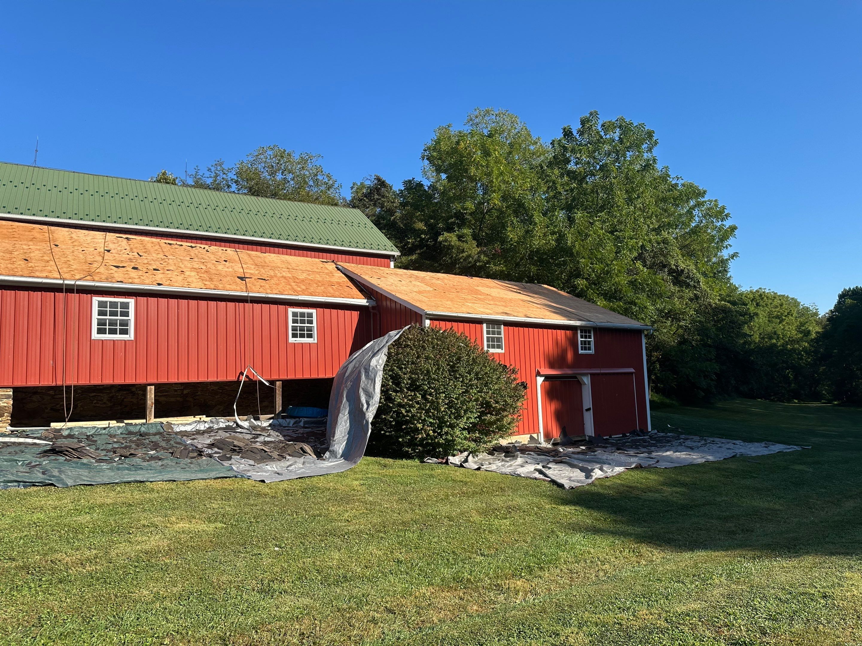 Stunning Metal Roof Transformation on a Classic Red Barn in New Freedom, PA by Bealing Roofing & Exteriors
