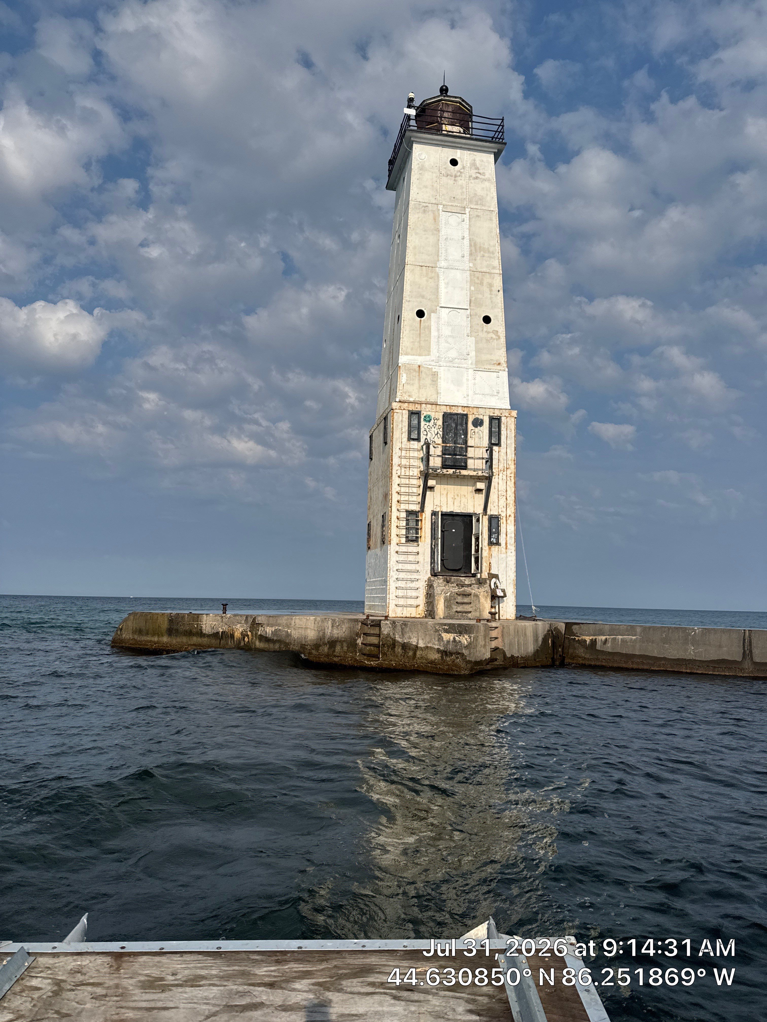 Historical Restoration and Coating of Frankfort North Breakwater Lighthouse by Finkle Preservation & Construction 