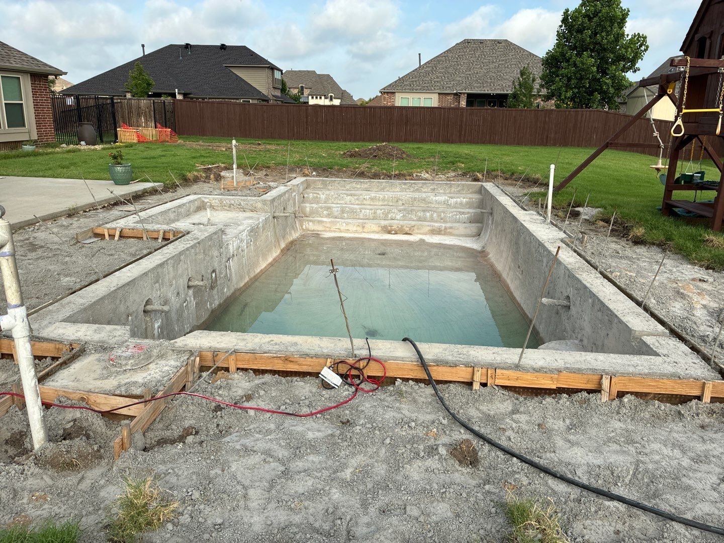 Custom In-Ground Rectangular Pool Installation in Wylie by Hobert Pools
