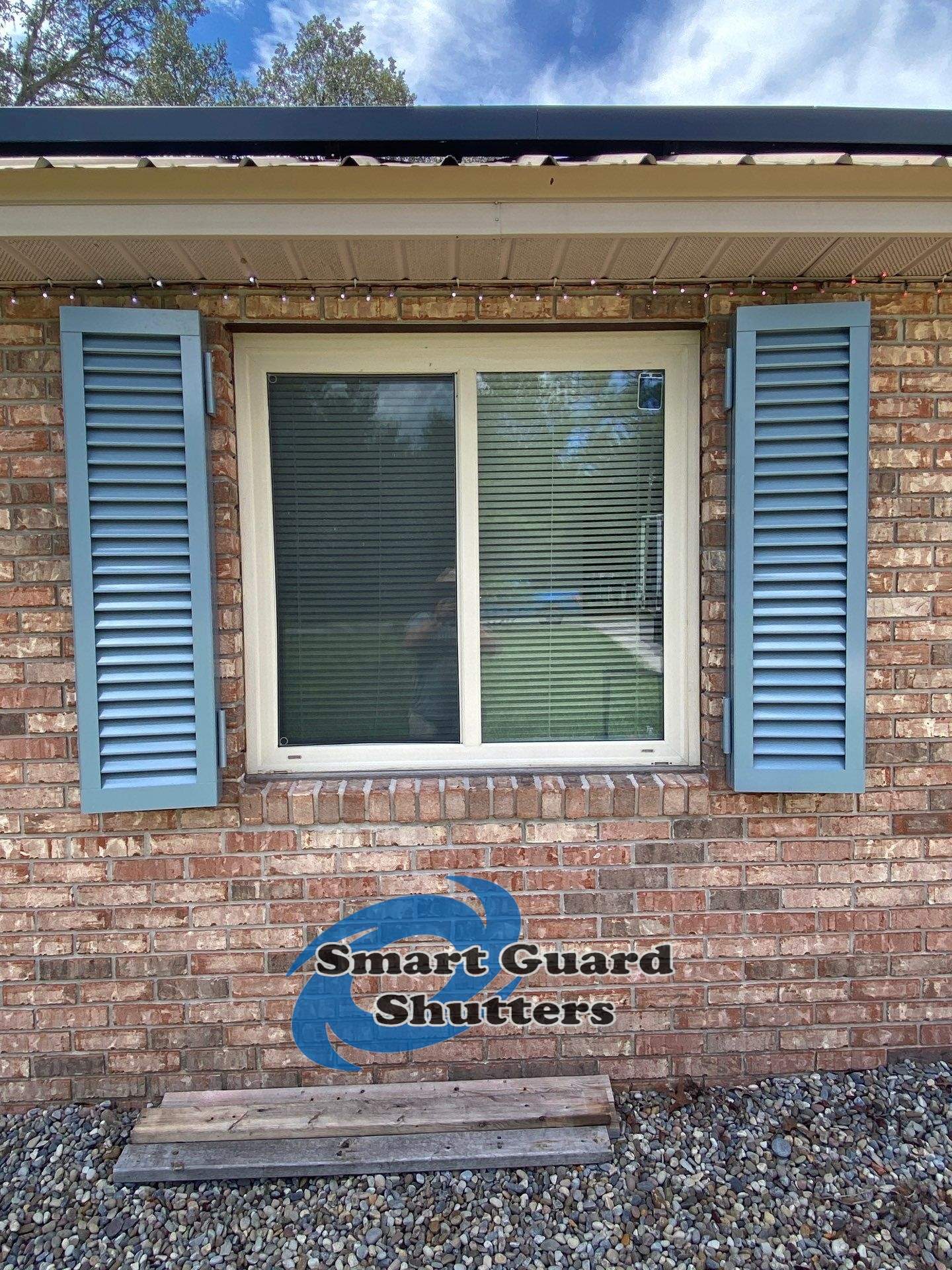 Impact Colonial Shutters in Squirrel Grey by Smart Guard Shutters