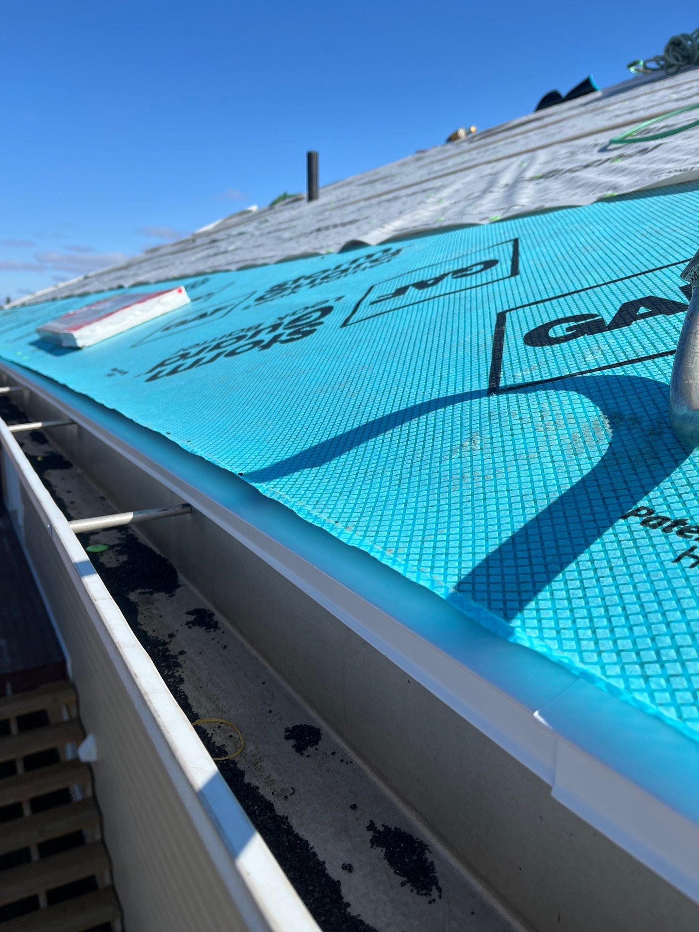 Residential Roofing Installation using Asphalt GAF HDZ in Charcoal by Artisan Roofing & Home Improvements Inc.