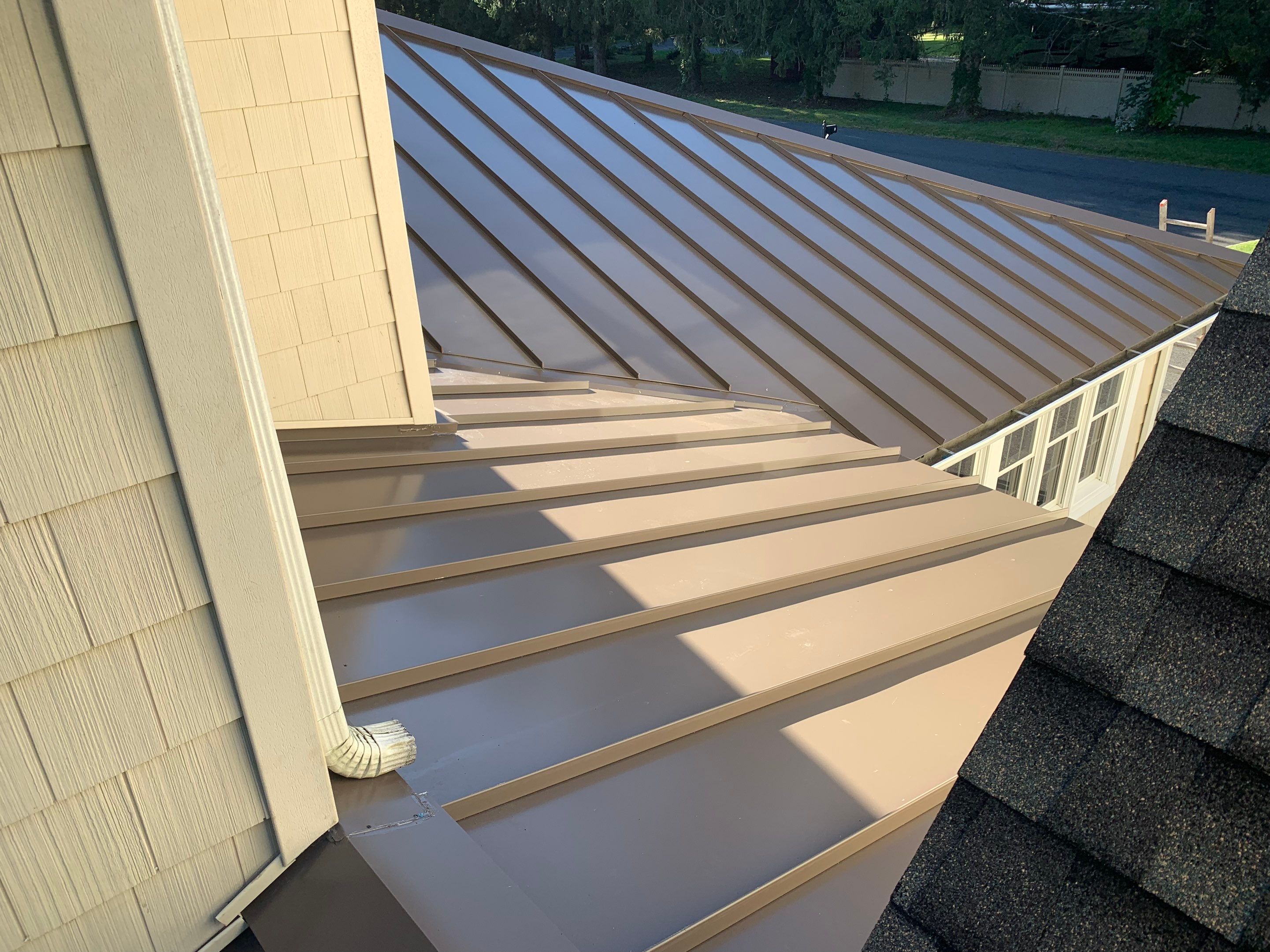 Asphalt & Standing Seam Metal Roof Replacement  by Lecla Home Improvements and Roofing INC