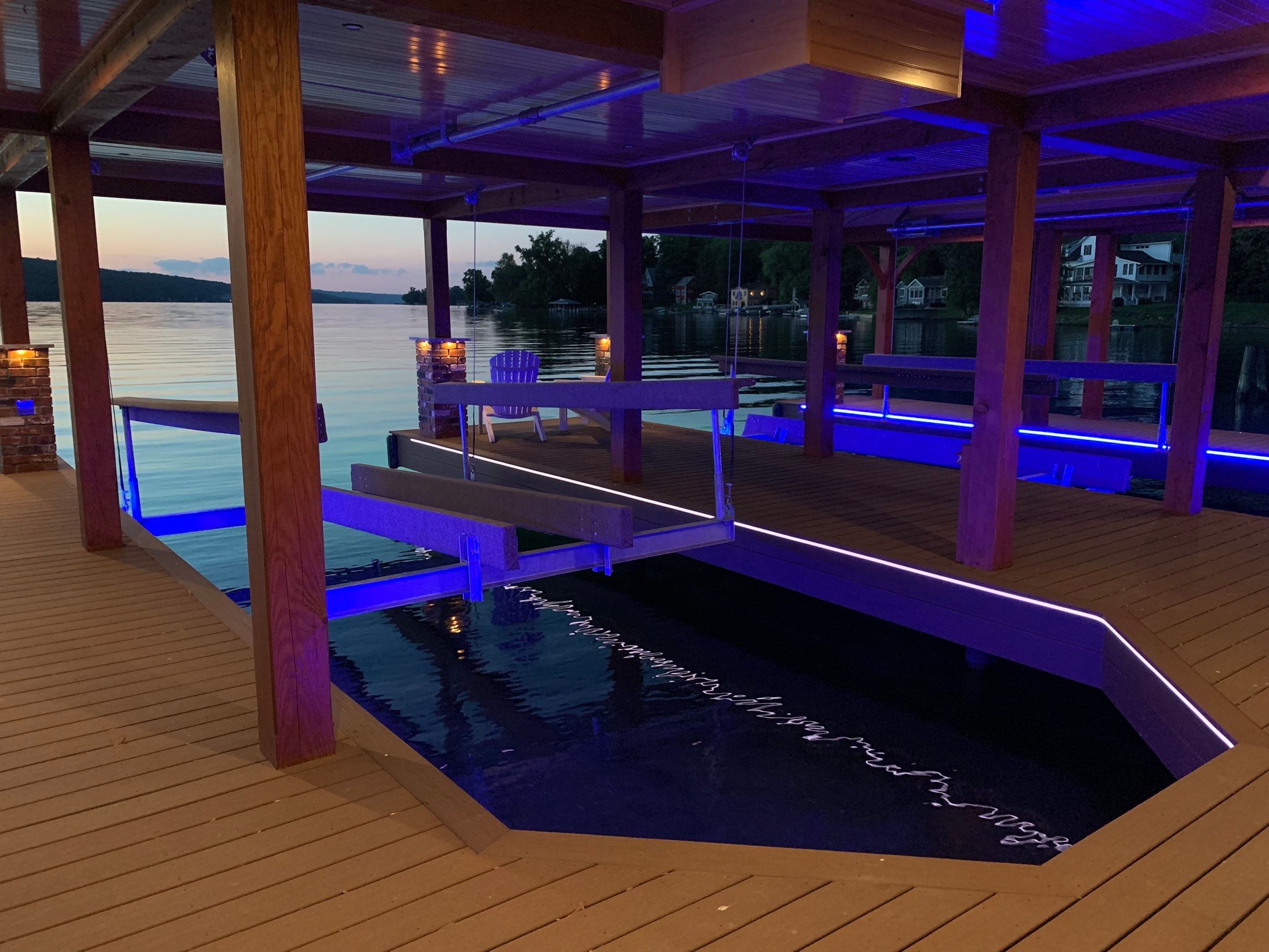 Custom Timber-Framed Boat Dock with Multi-Color LED Lighting on Keuka Lake, New York by Outdoor Lights + Shades