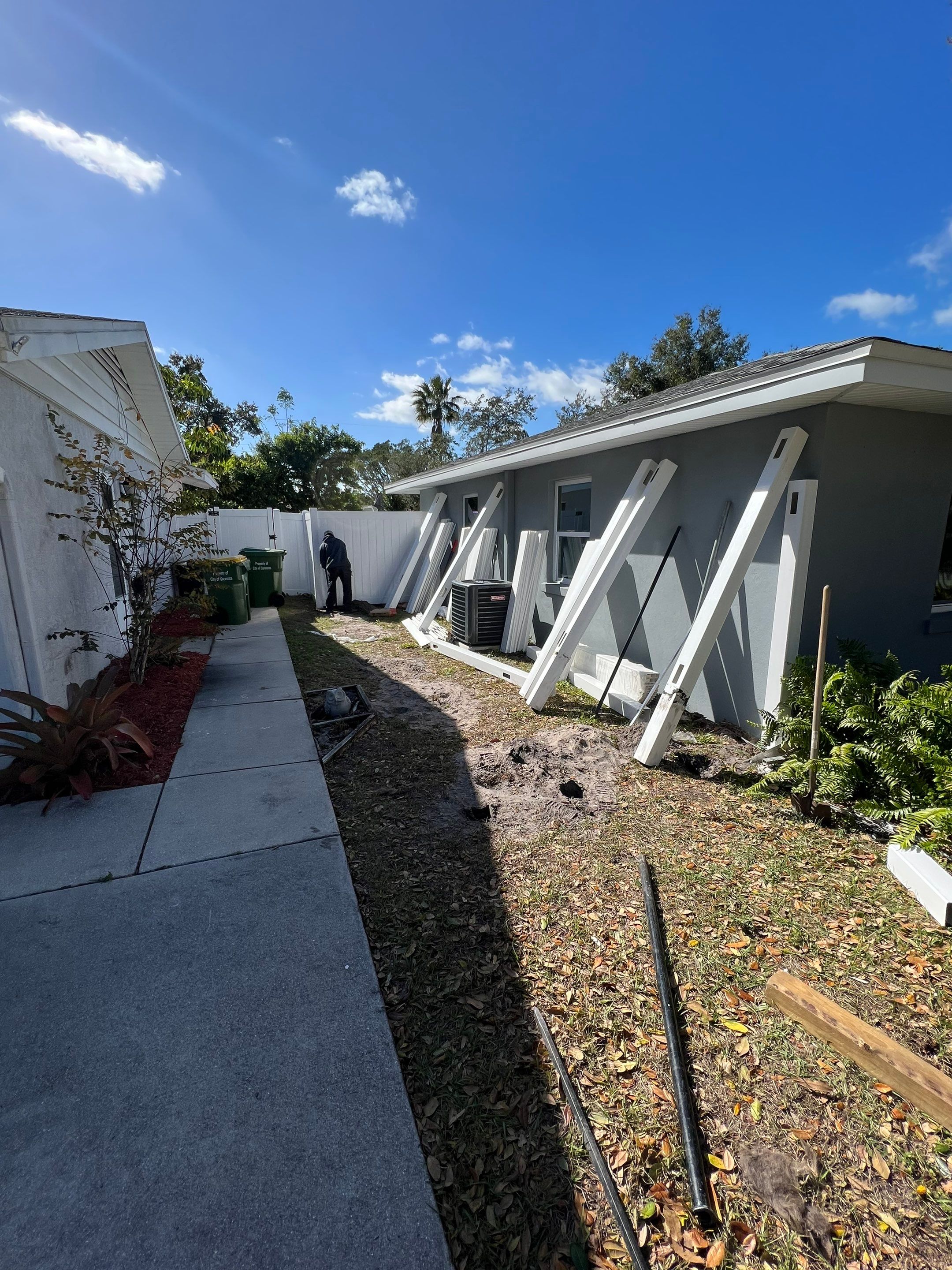 Vinyl Privacy Fence With AC Enclosure and Storage Corral by Asap fence and gates, LLC