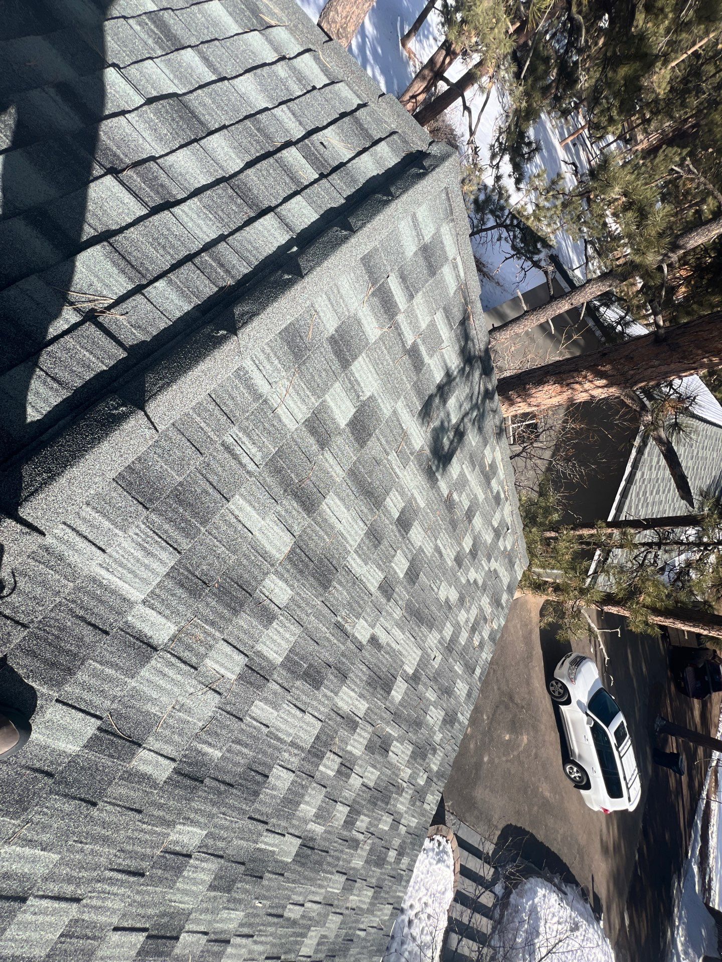Residential Roofing Installation using Stone Coated Steel by Blue Peaks Roofing LLC 