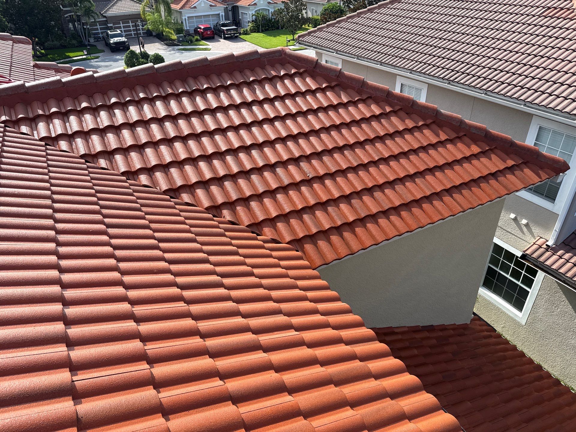 Soft Wash Tile Roof Cleaning in Sonoma Community, Sarasota, FL by Sunshine AquaWash