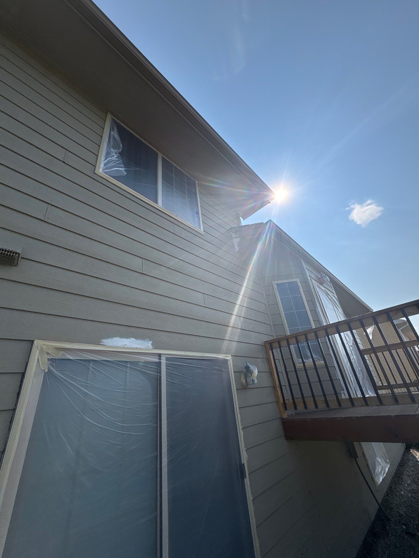 Residential Exterior Painting and Siding Refresh in Sioux Falls by Select Painting, Coatings & Garage Cabinets