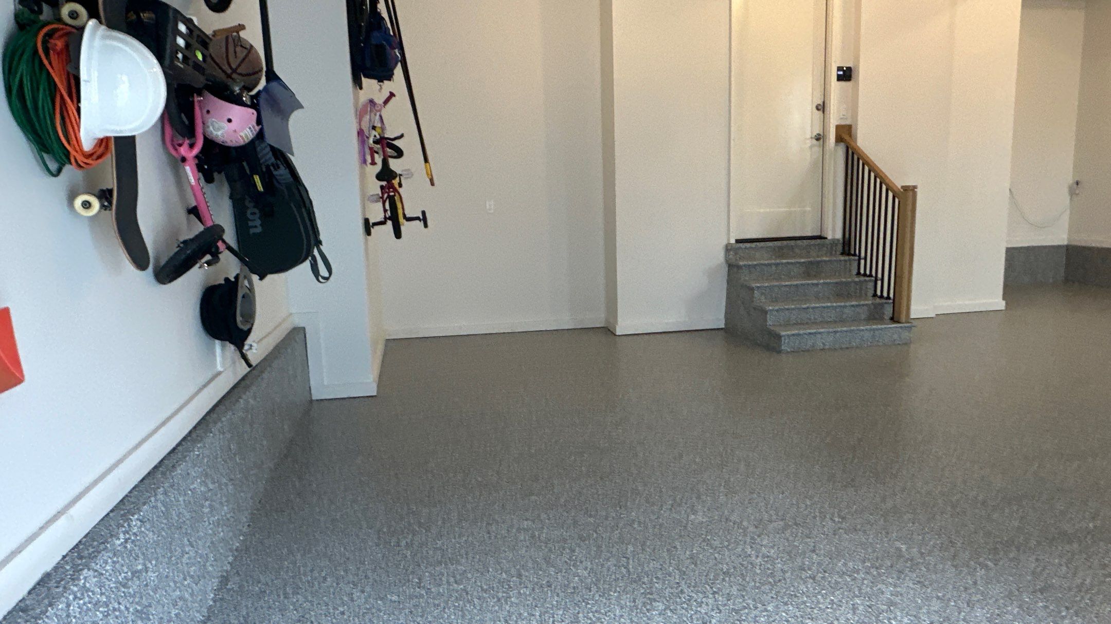 Max R. upgraded his garage with overhead racks and a New floor  by Banner Garage