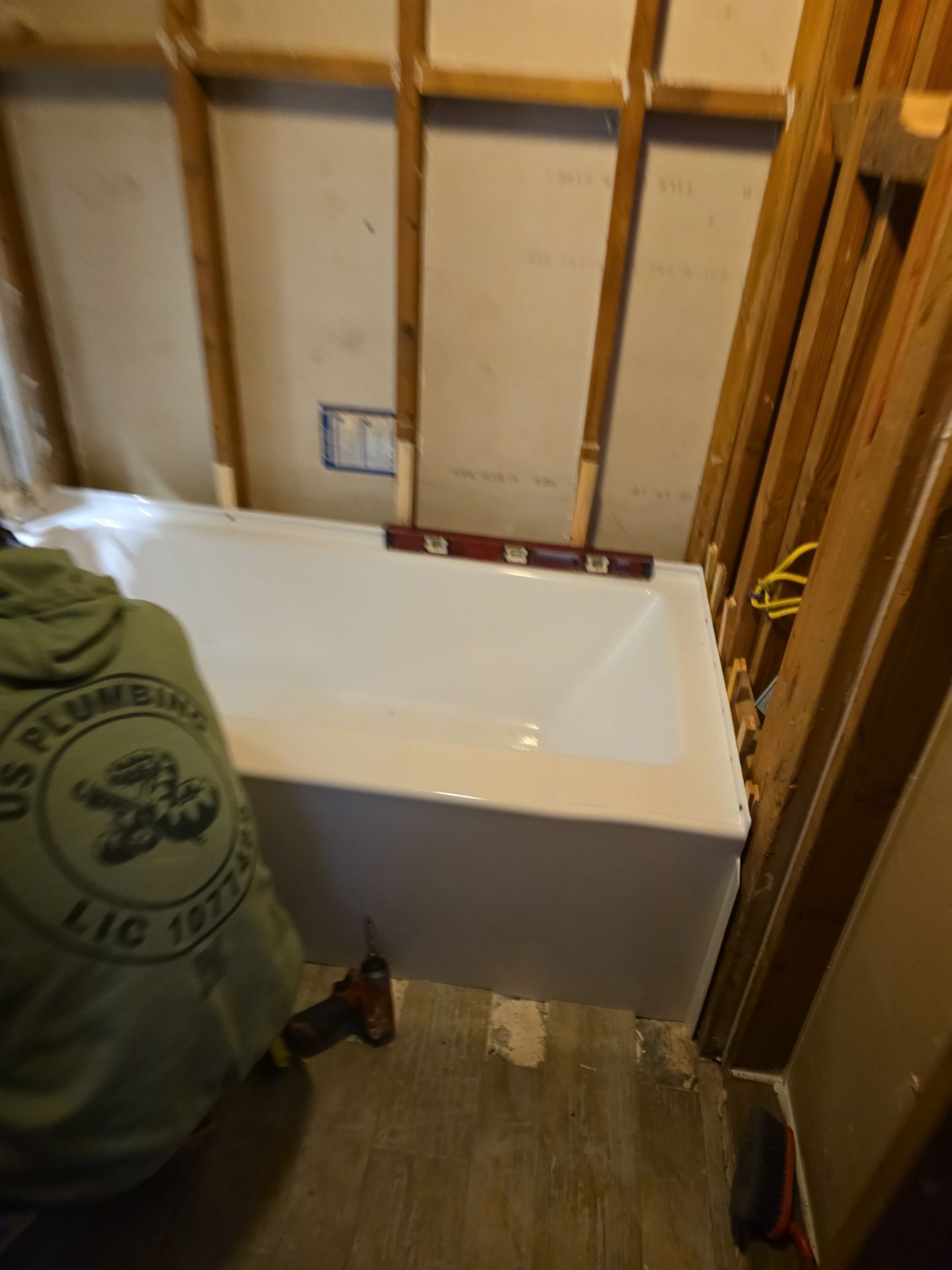 Shower Tub Installation with Underground Plumbing by Us Plumbing 