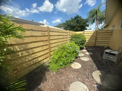 Wood Fence Installation using Wood Pressure Treated Fence 